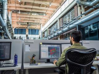 person at computer using BIM modelling software