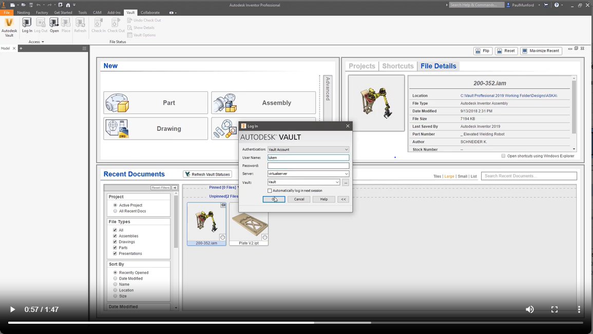 screenshot of login window over tables and fields in autodesk vault software