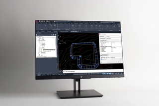 Computer with Cadpro Tools for Civil 3D on screen