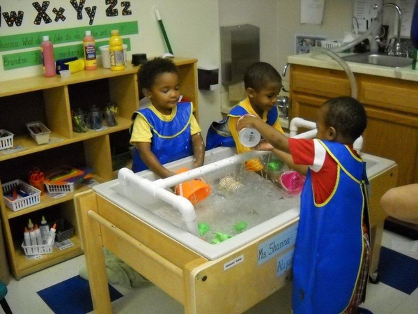 children playing in the water tray