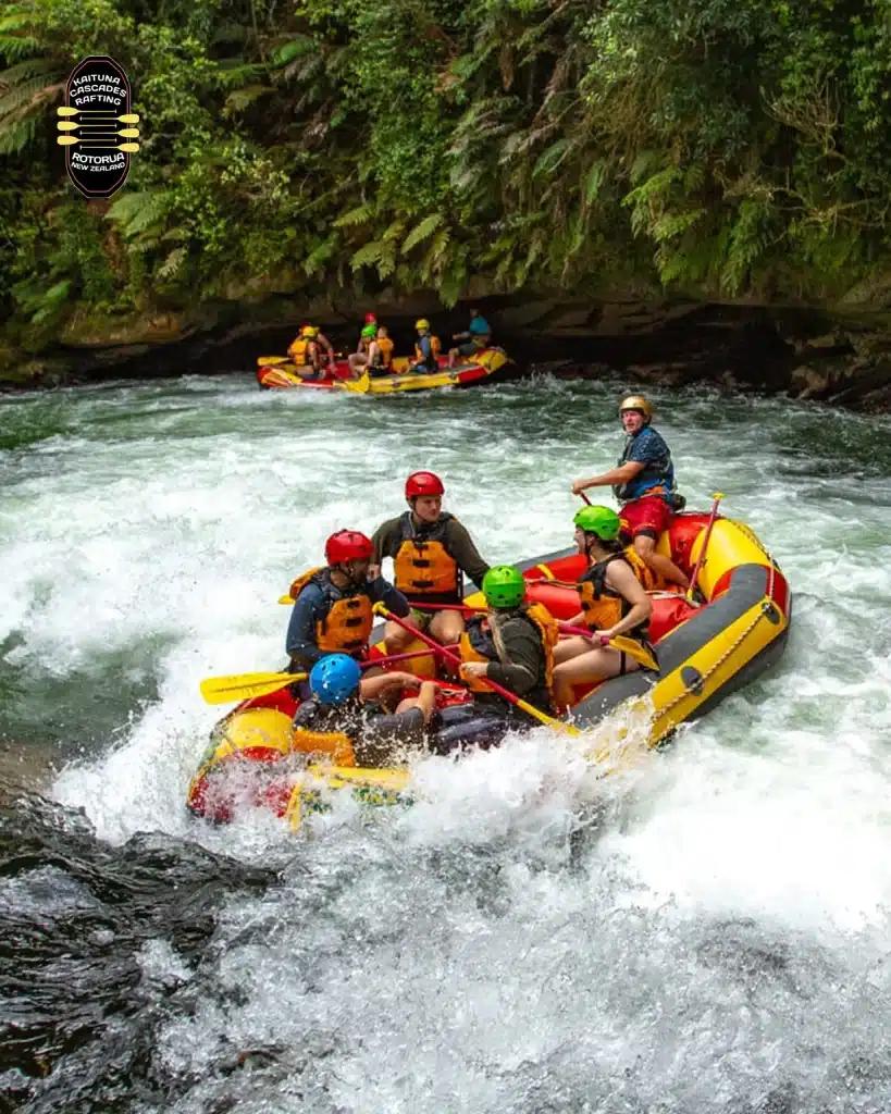 Kaituna Cascades guests paddling a yellow raft through white water on the Kaituna River, Rotorua.