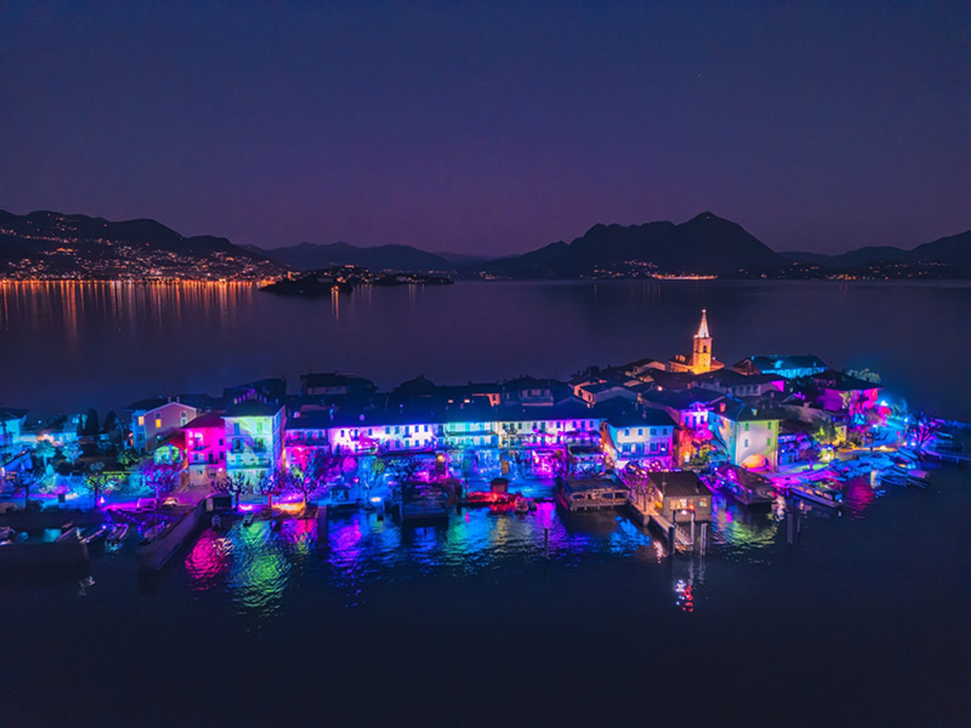 Isola dei Pescatori on Lake Maggiore illuminated with Christmas lights