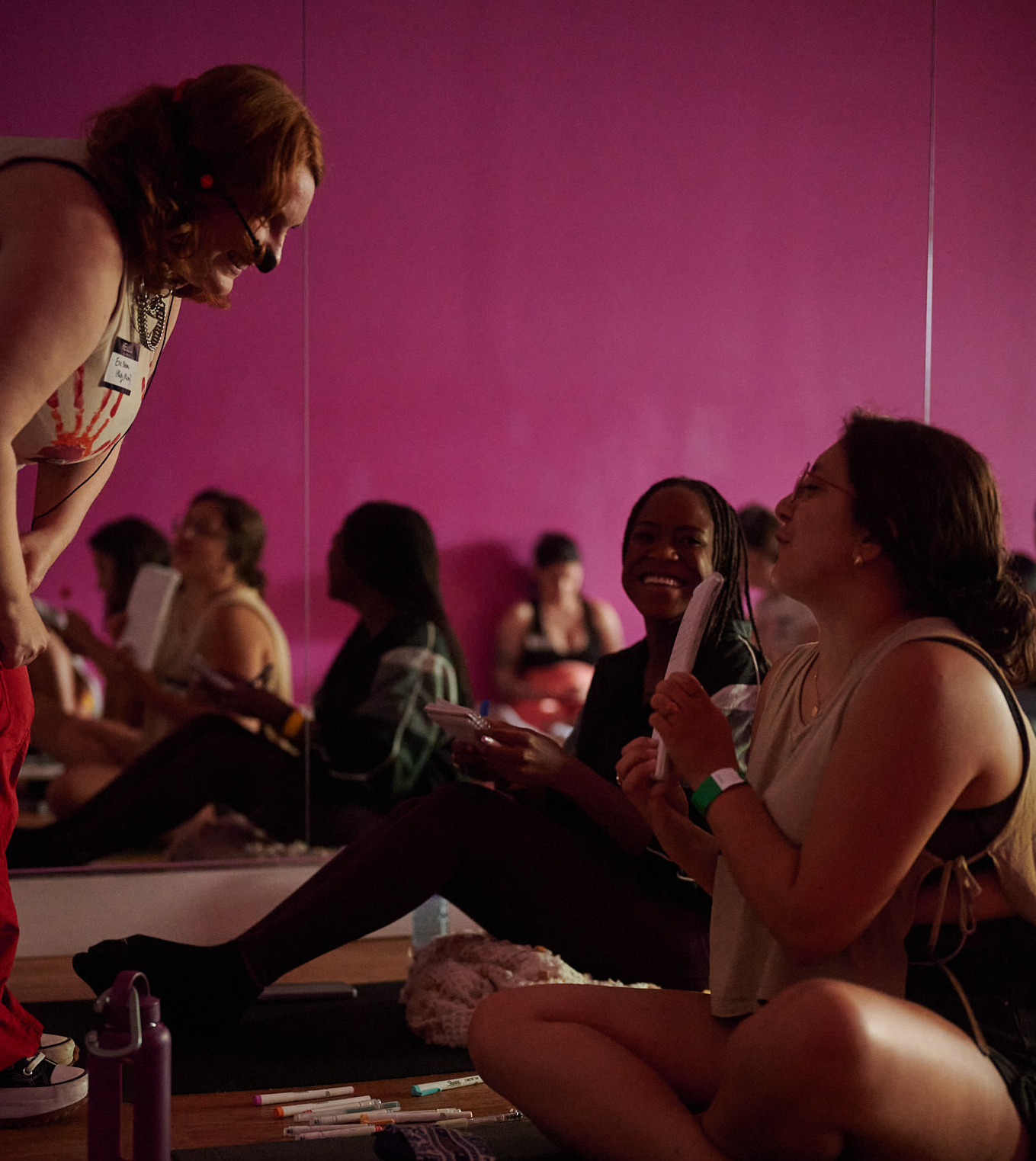 Women showing her paper to 2 
