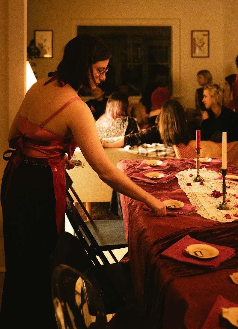 Sara setting up sapphic dinner