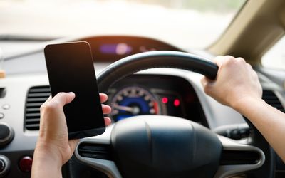 Distracted Driving in Ontario: Penalties, Insurance Impact, and What Actually Counts
