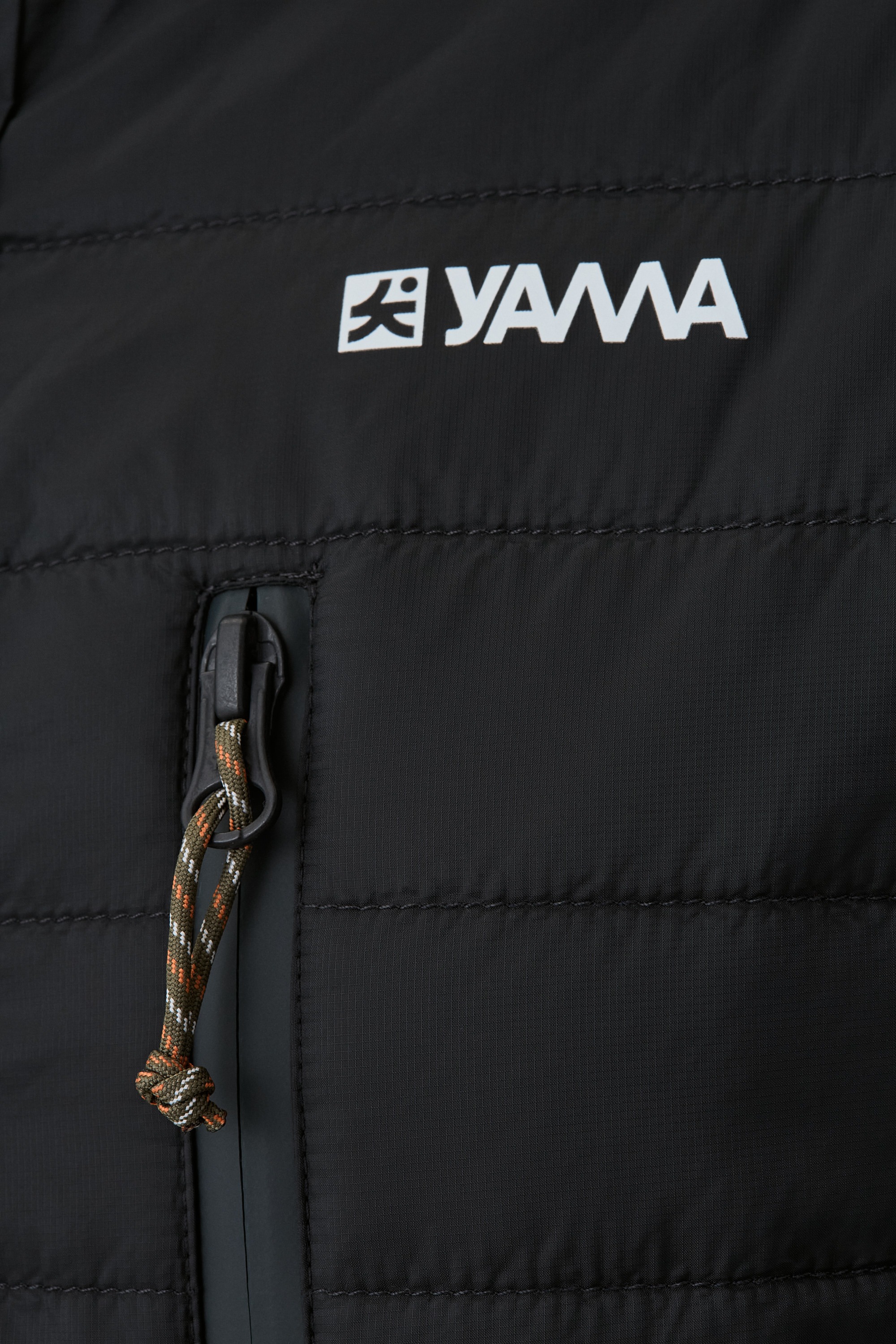 Model wearing Yama Ember Puffer Shirt Anthracite