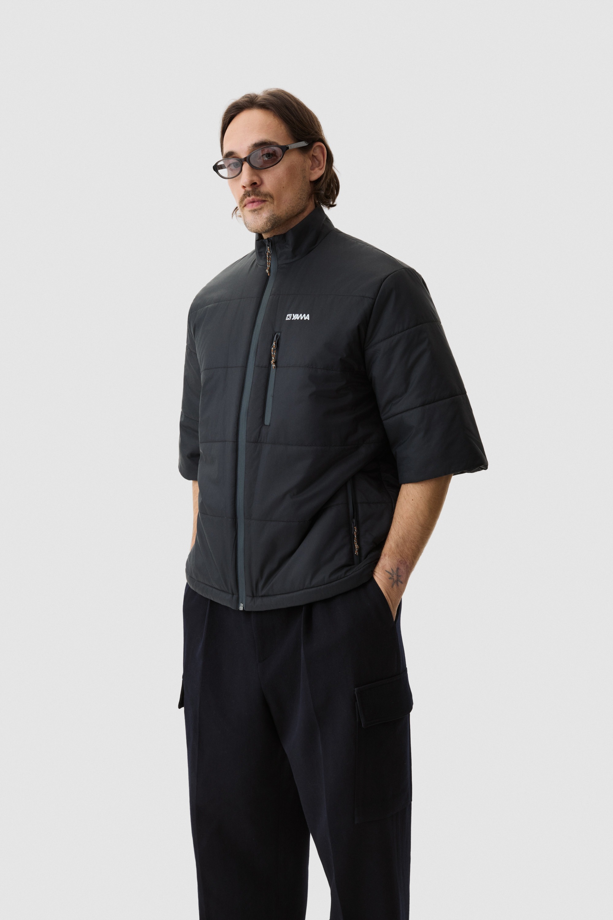 Model wearing Yama Strata Puffer Jacket Anthracite