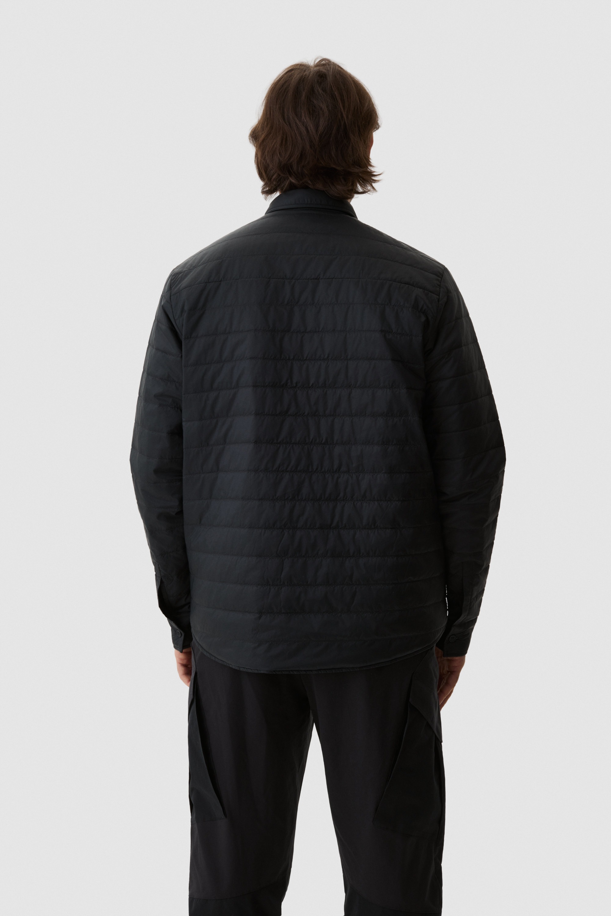 Model wearing Yama Ember Puffer Shirt Anthracite