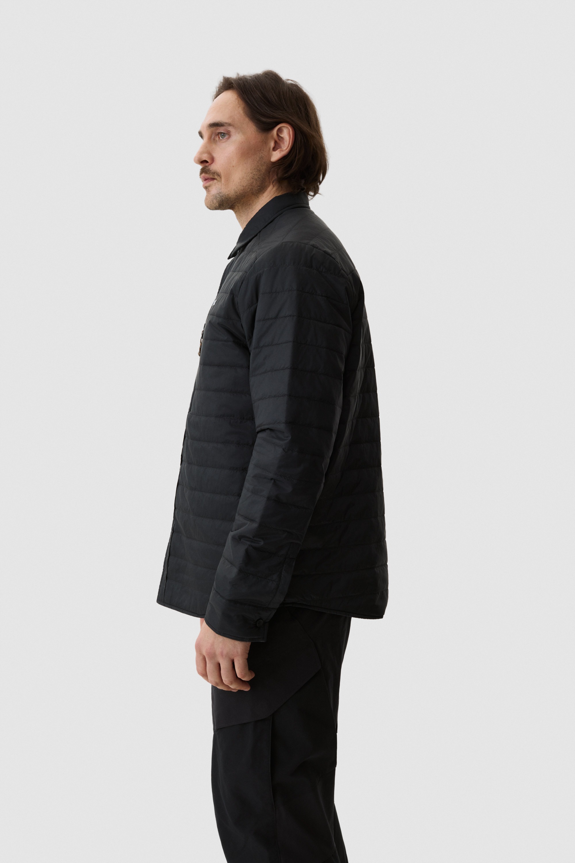 Model wearing Yama Ember Puffer Shirt Anthracite