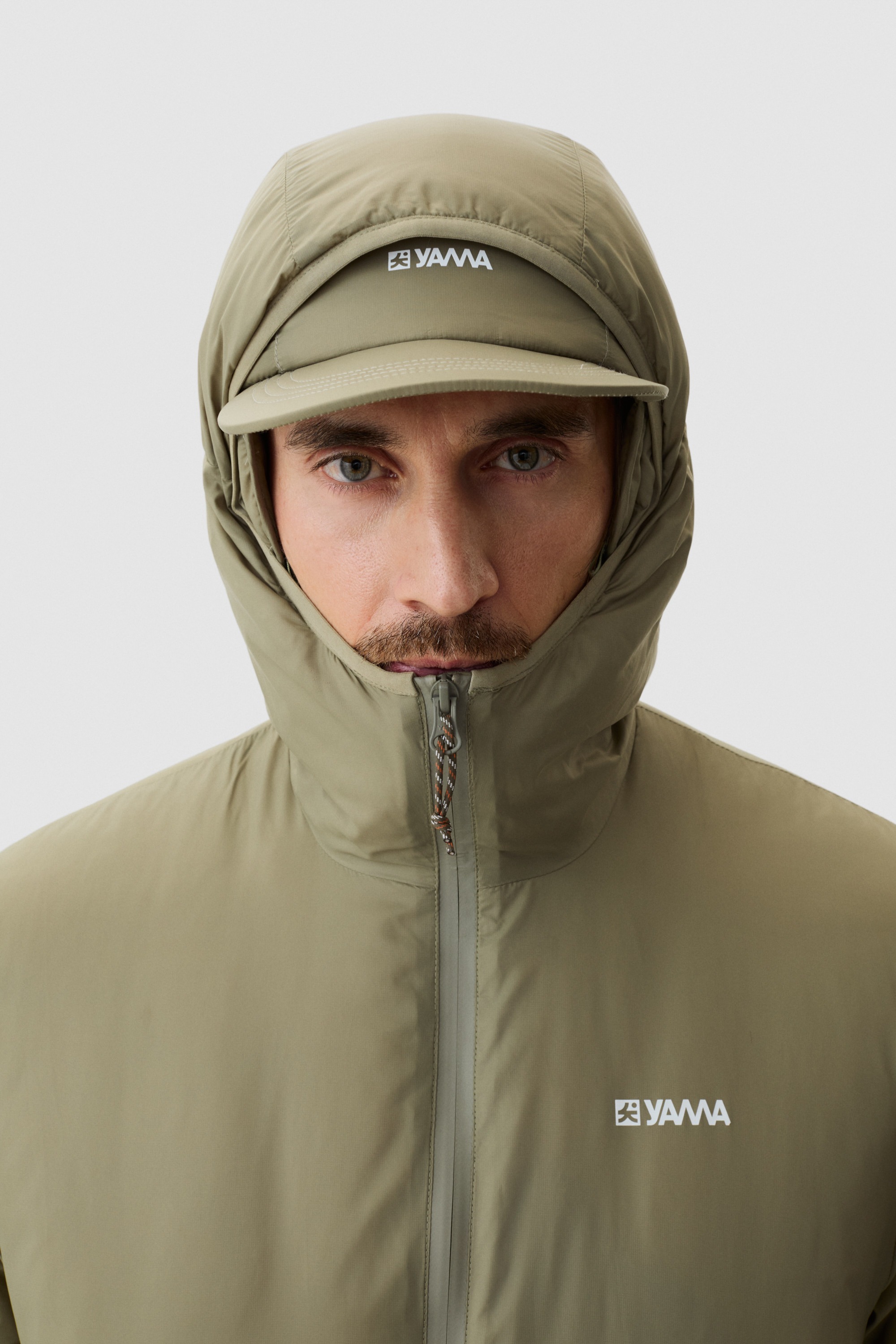 Model wearing Yama Kinetic Trek Jacket Moss Green