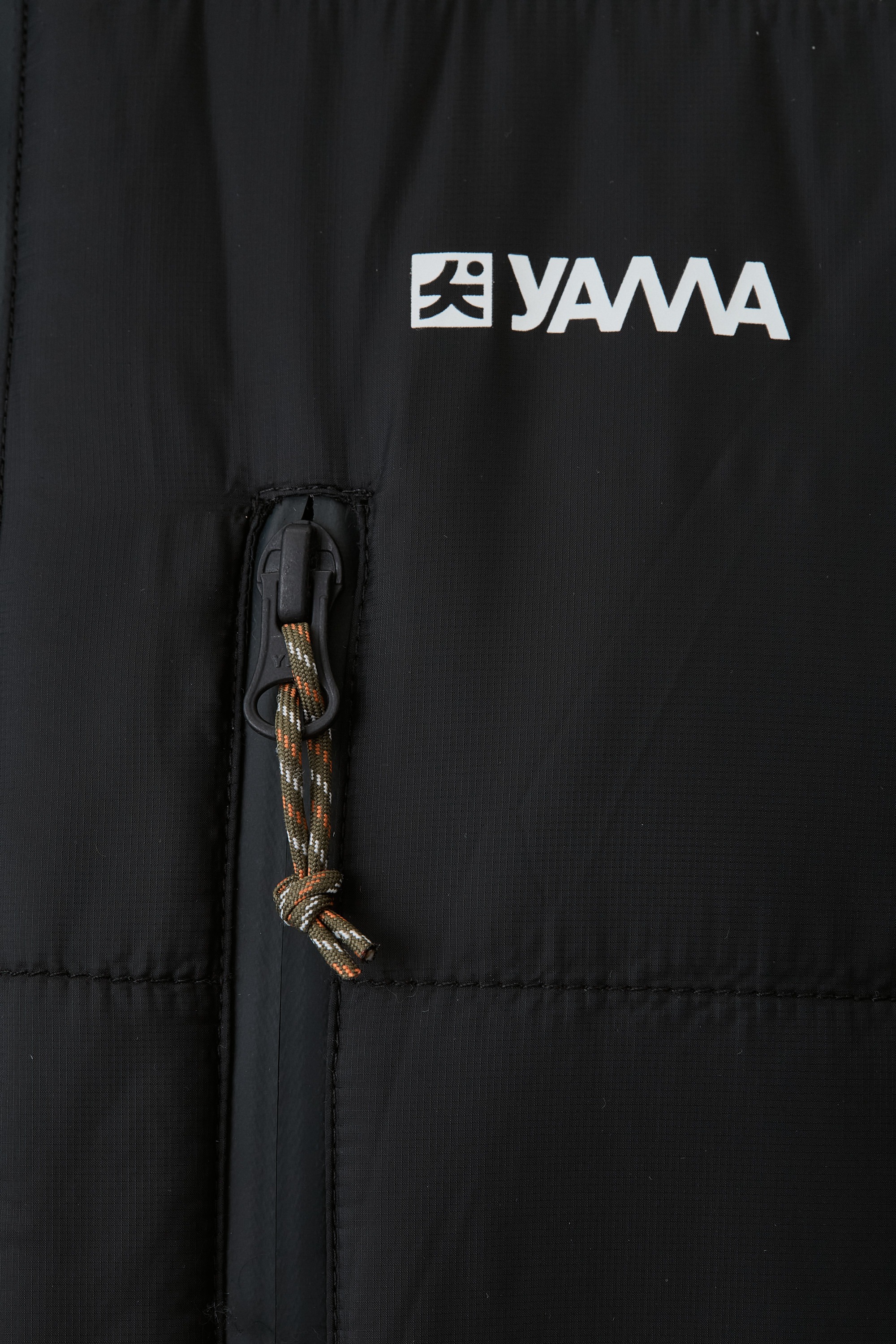 Model wearing Yama Strata Puffer Jacket Anthracite