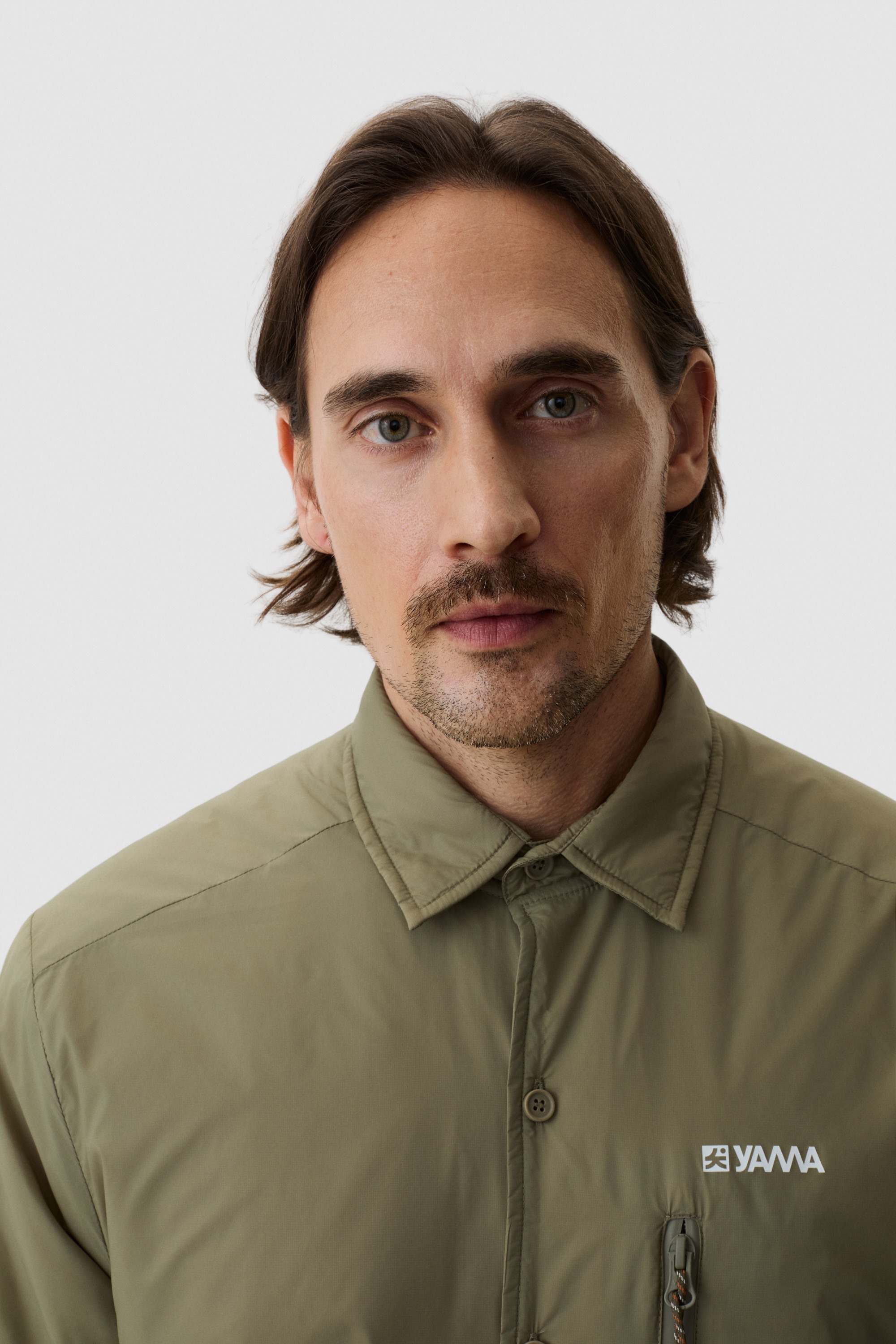 Model wearing Yama Gradient Tech Shirt Moss Green