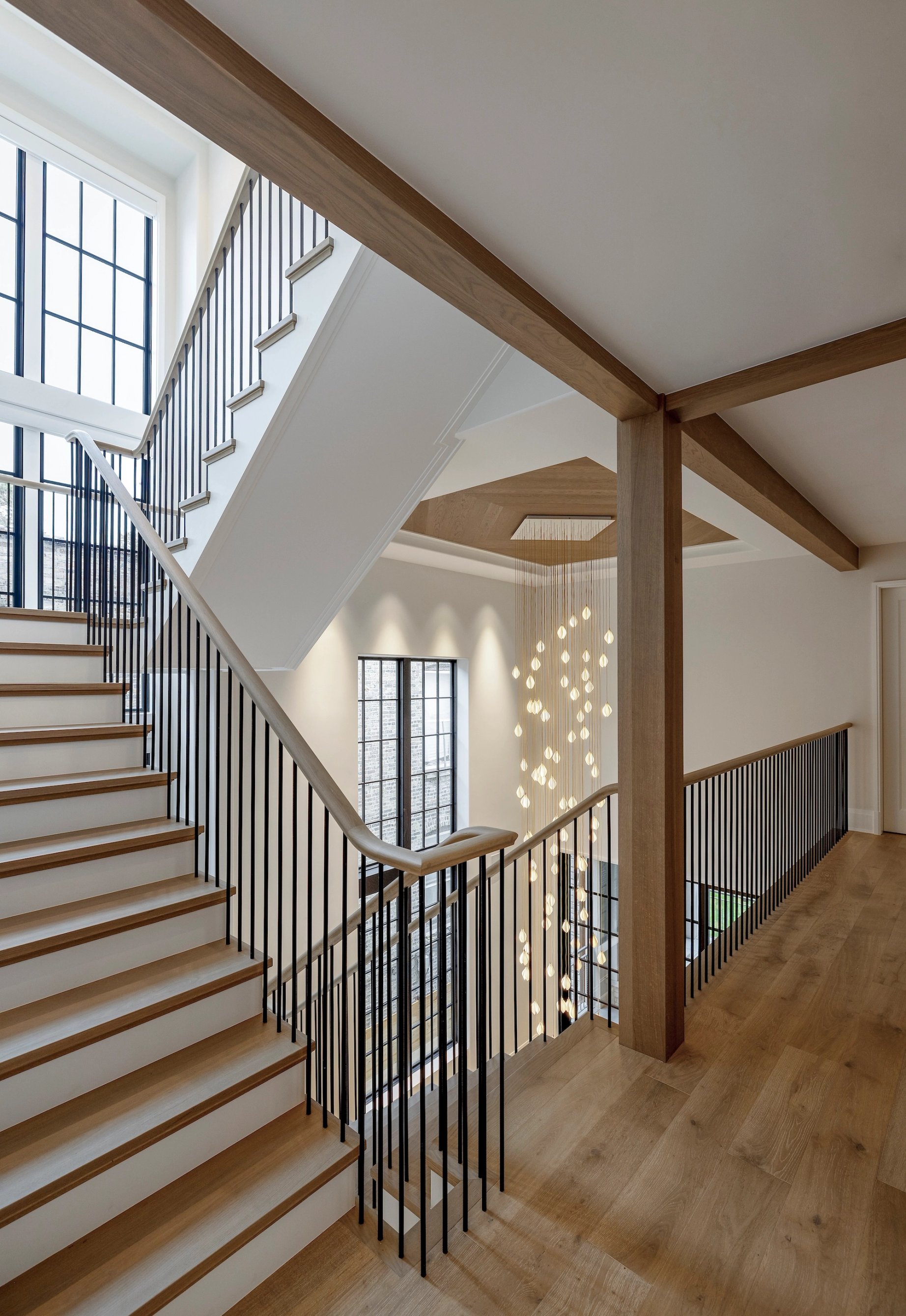 Dawn Reeves Design Luxury Interior Design Chicago Illinois Erie Staircase Bubble Pendant