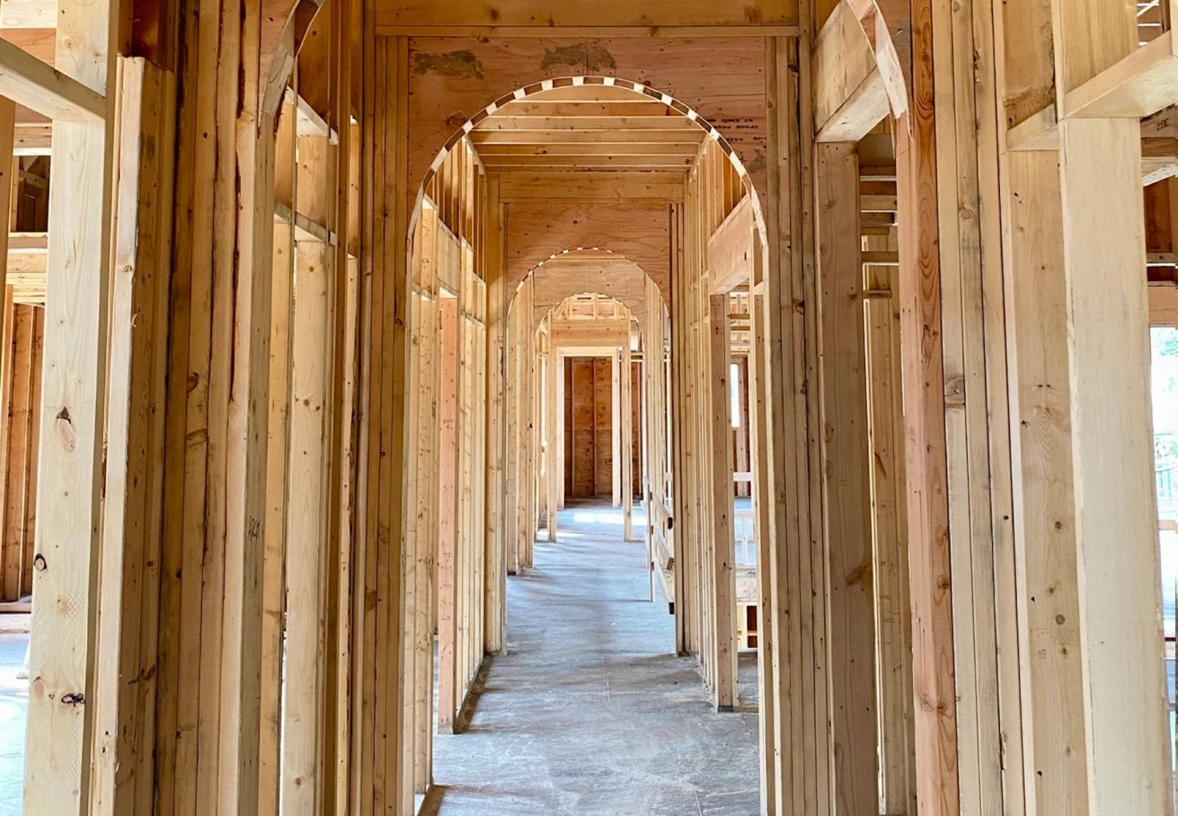 Dawn Reeves Design Luxury Interior Design Chicago Illinois Construction Framing Arched Hallway Corridor