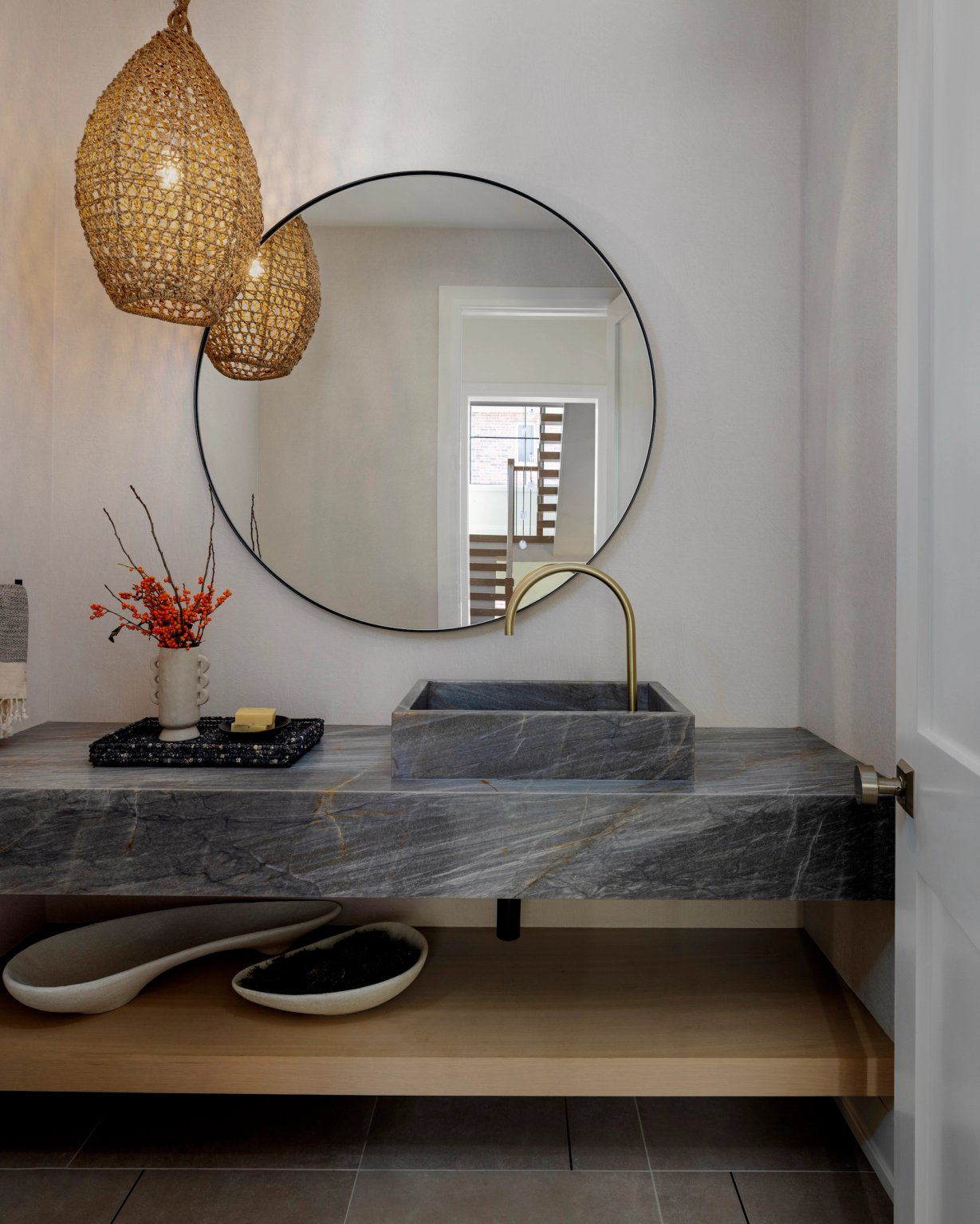 Dawn Reeves Design Luxury Interior Design Chicago Illinois Vallette Powder Room Round Mirror Stone Sink