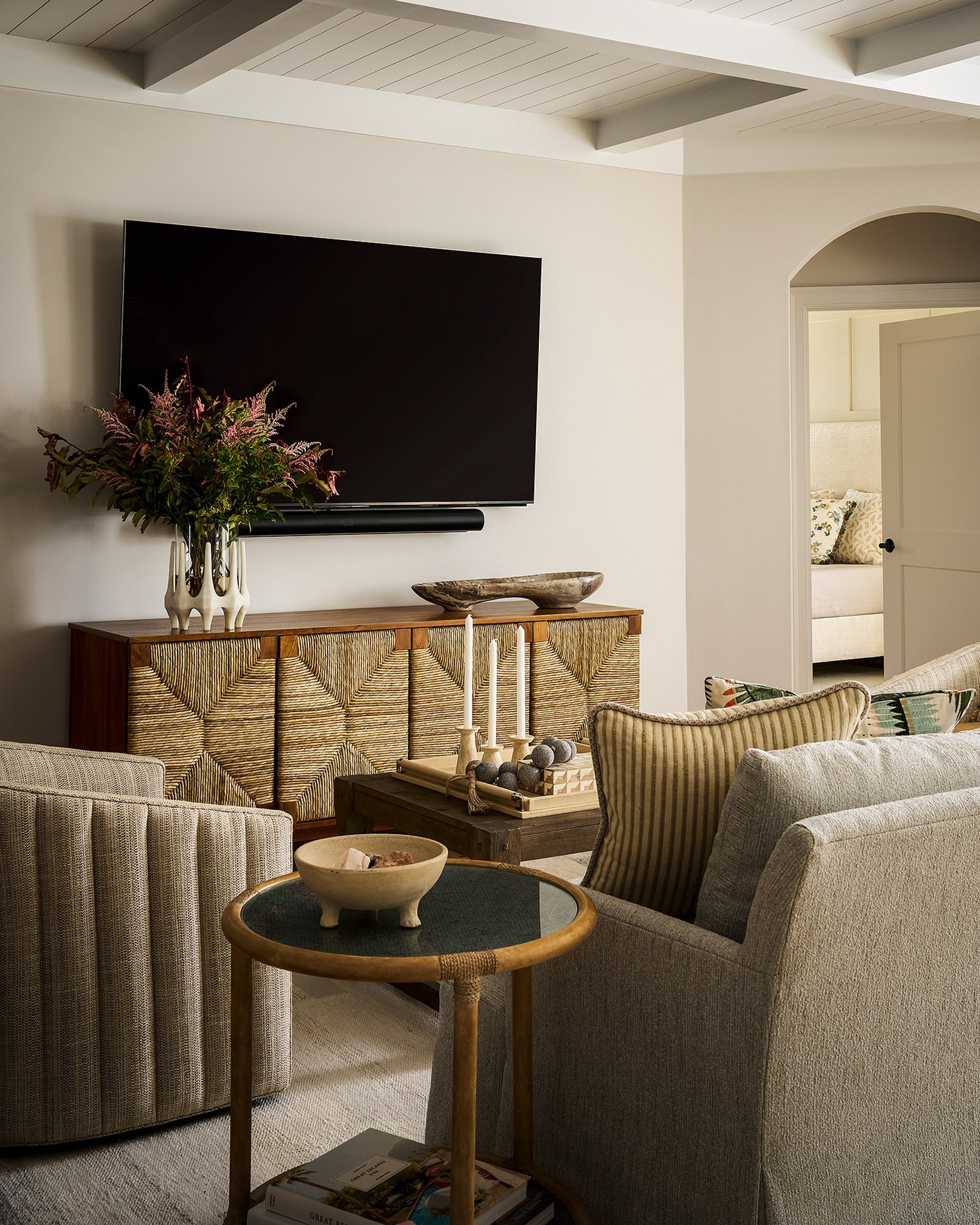 Dawn Reeves Design Luxury Interior Design Chicago Illinois Melrose TV Room Woven Sideboard Swivels