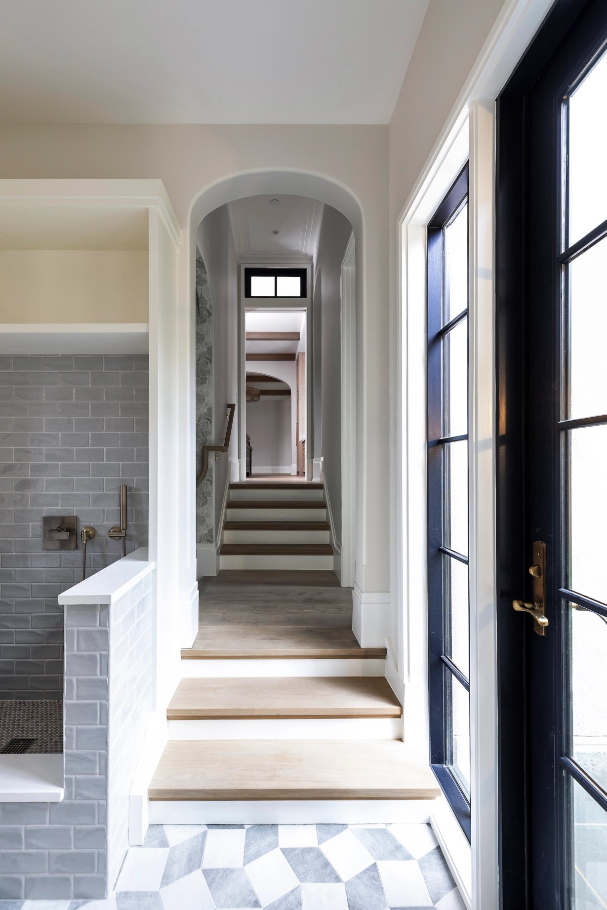 Dawn Reeves Design Luxury Interior Design Chicago Illinois Erie Hallway Stairs Marble Floor