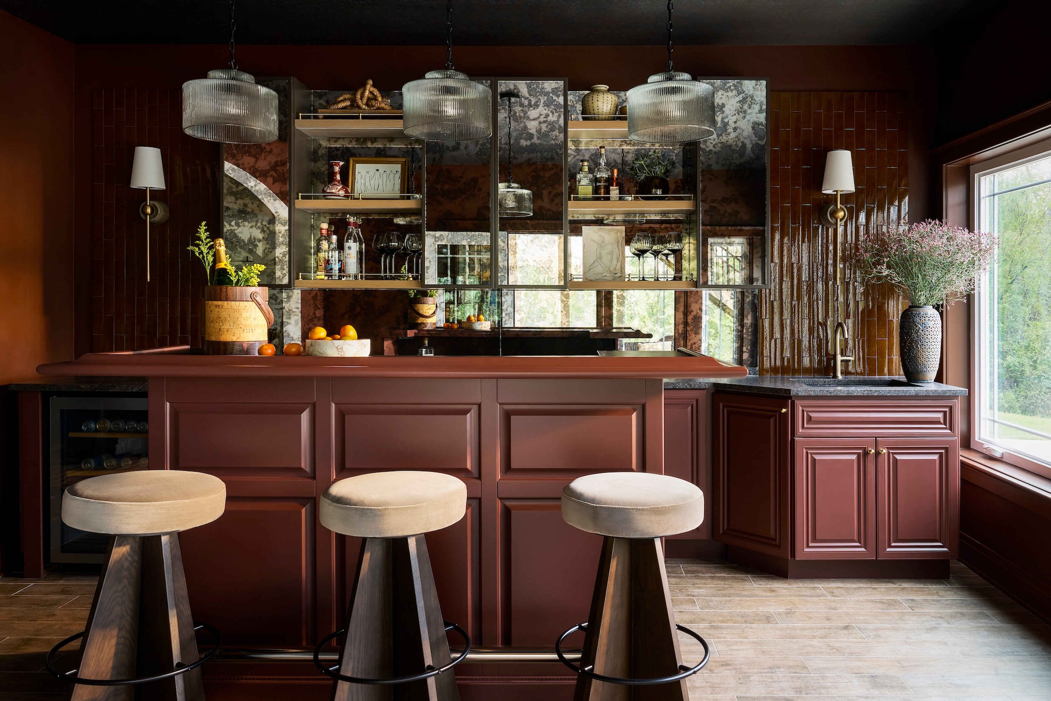 Dawn Reeves Design Luxury Interior Design Chicago Illinois Lake Geneva Wet Bar Antique Mirror Shelving Red Cabinets
