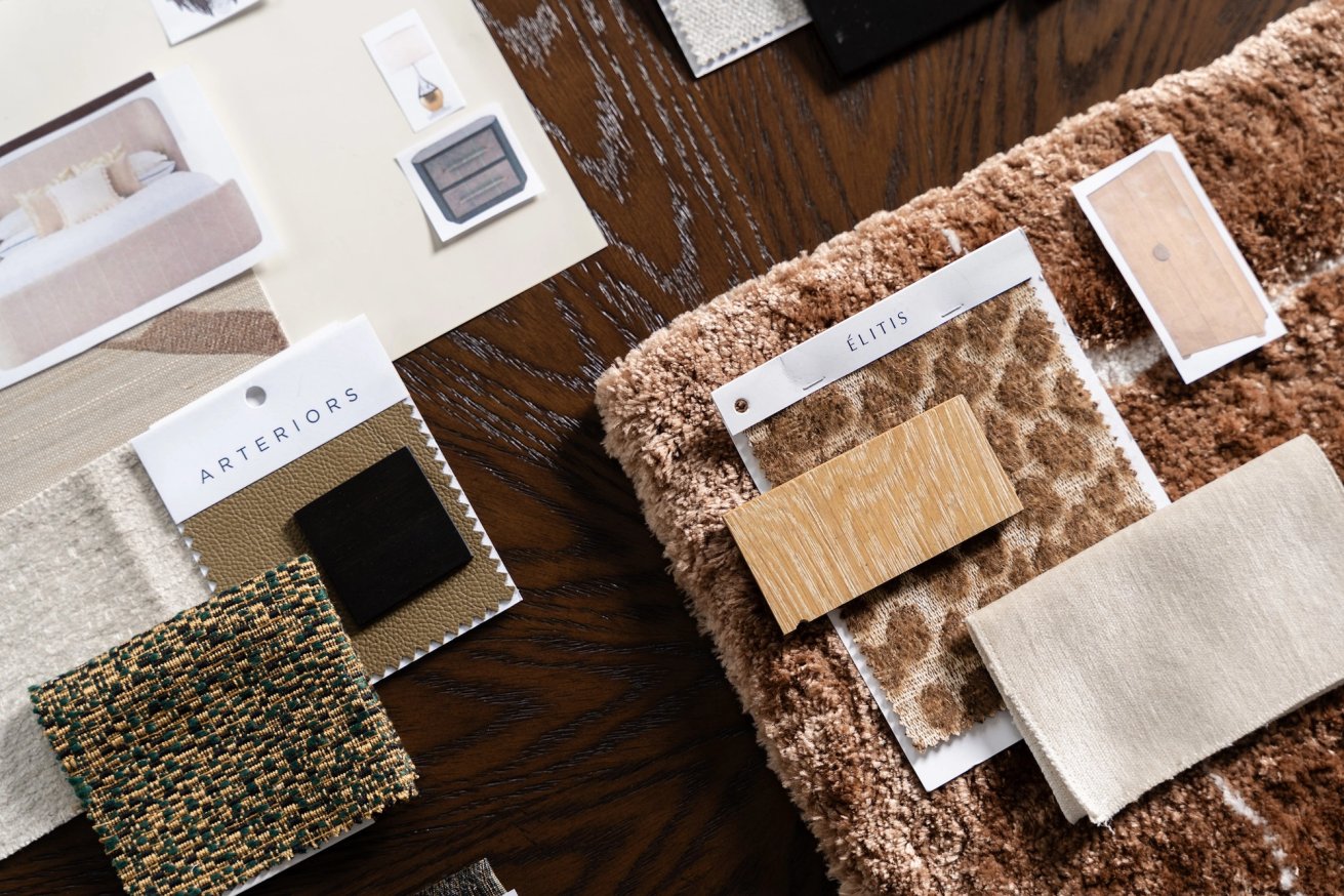 Dawn Reeves Design Luxury Interior Design Chicago Illinois Flatlay Fabric And Material Swatches On Dark Table
