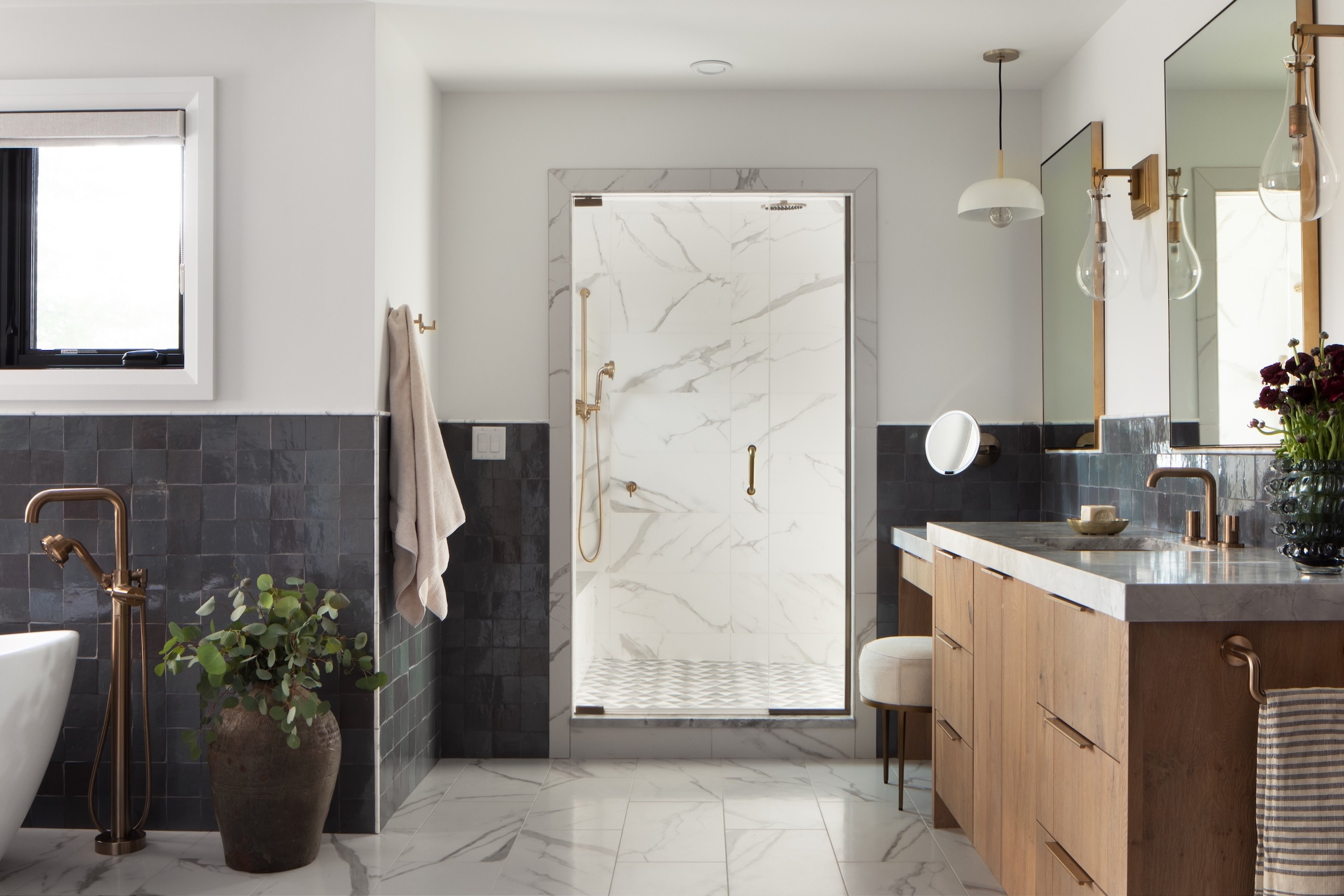 Dawn Reeves Design Luxury Interior Design Chicago Illinois Kenilworth 1 Primary Bath Navy Tile Brass Tub
