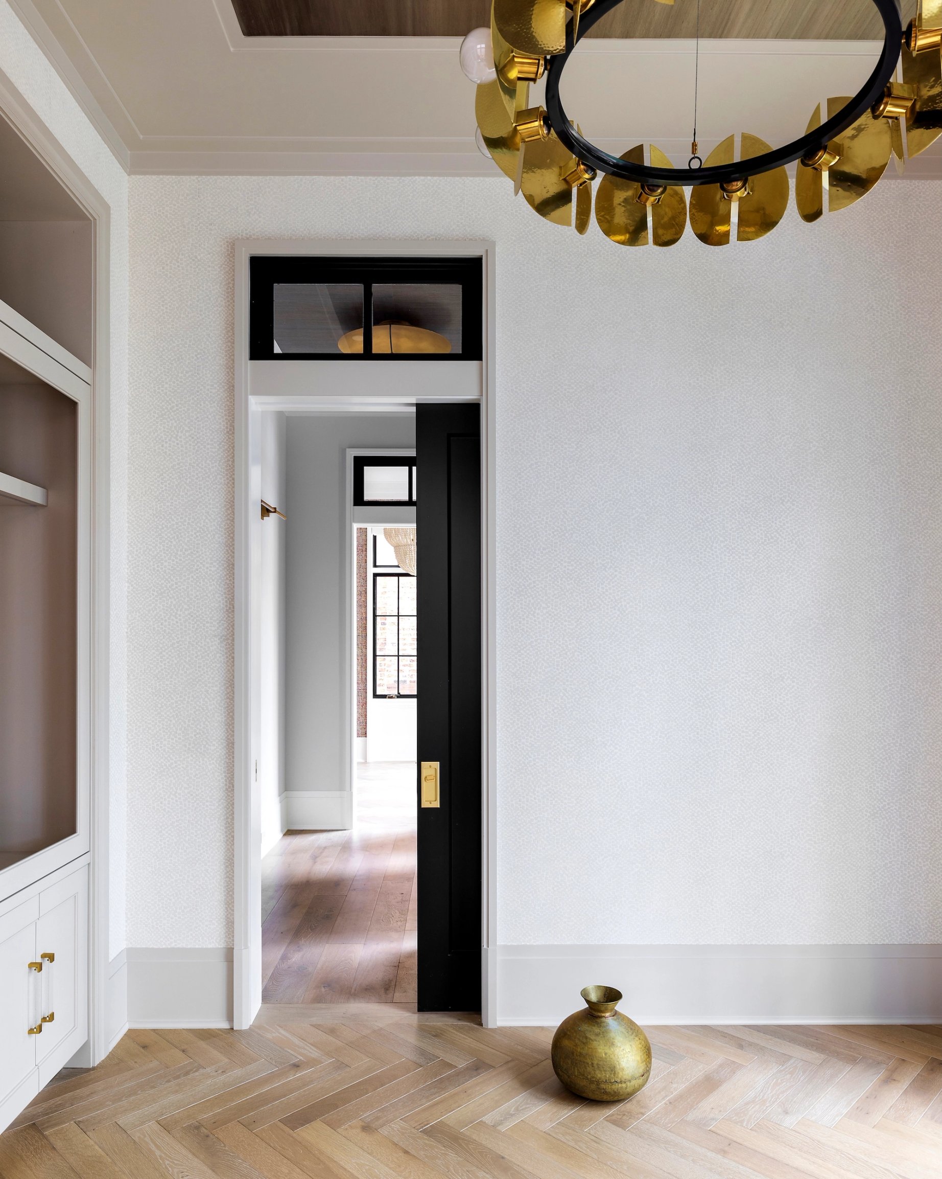 Dawn Reeves Design Luxury Interior Design Chicago Illinois Erie Hallway Brass Chandelier Vase