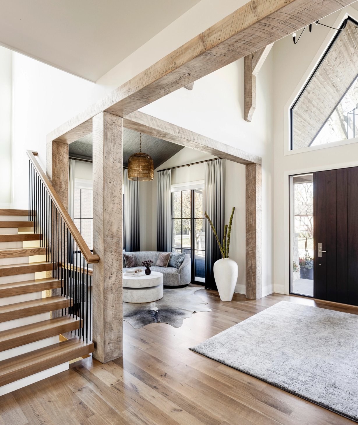 Dawn Reeves Design Luxury Interior Design Chicago Illinois Vallette Foyer Wood Beams Cowhide