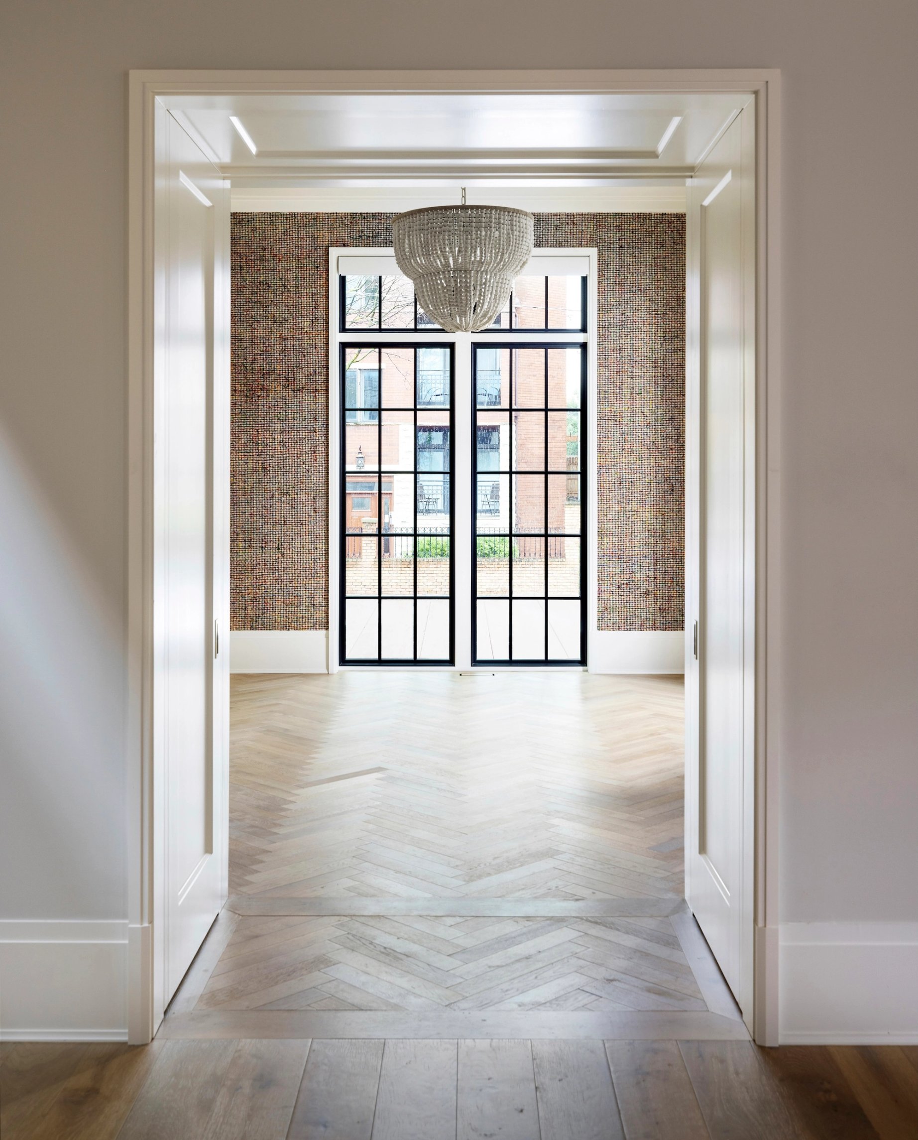 Dawn Reeves Design Luxury Interior Design Chicago Illinois Erie Dining Doorway Chandelier