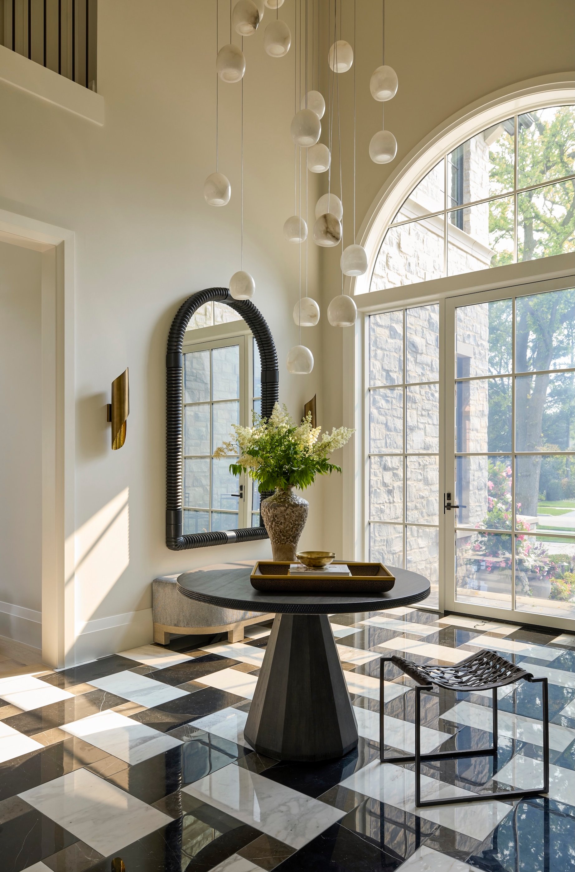 Dawn Reeves Design Luxury Interior Design Chicago Illinois Kenilworth II Foyer Round Mirror Bubble Pendants