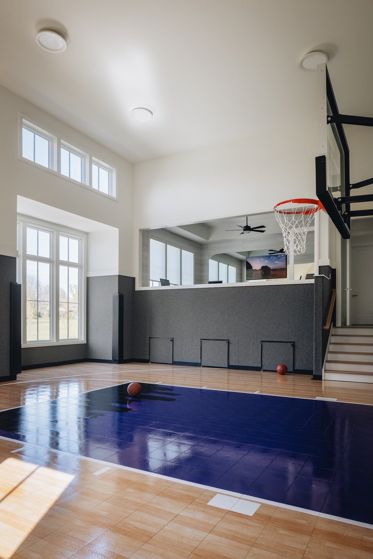Dawn Reeves Design Luxury Interior Design Chicago Illinois Hinsdale Indoor Basketball Court Hoop Stairs