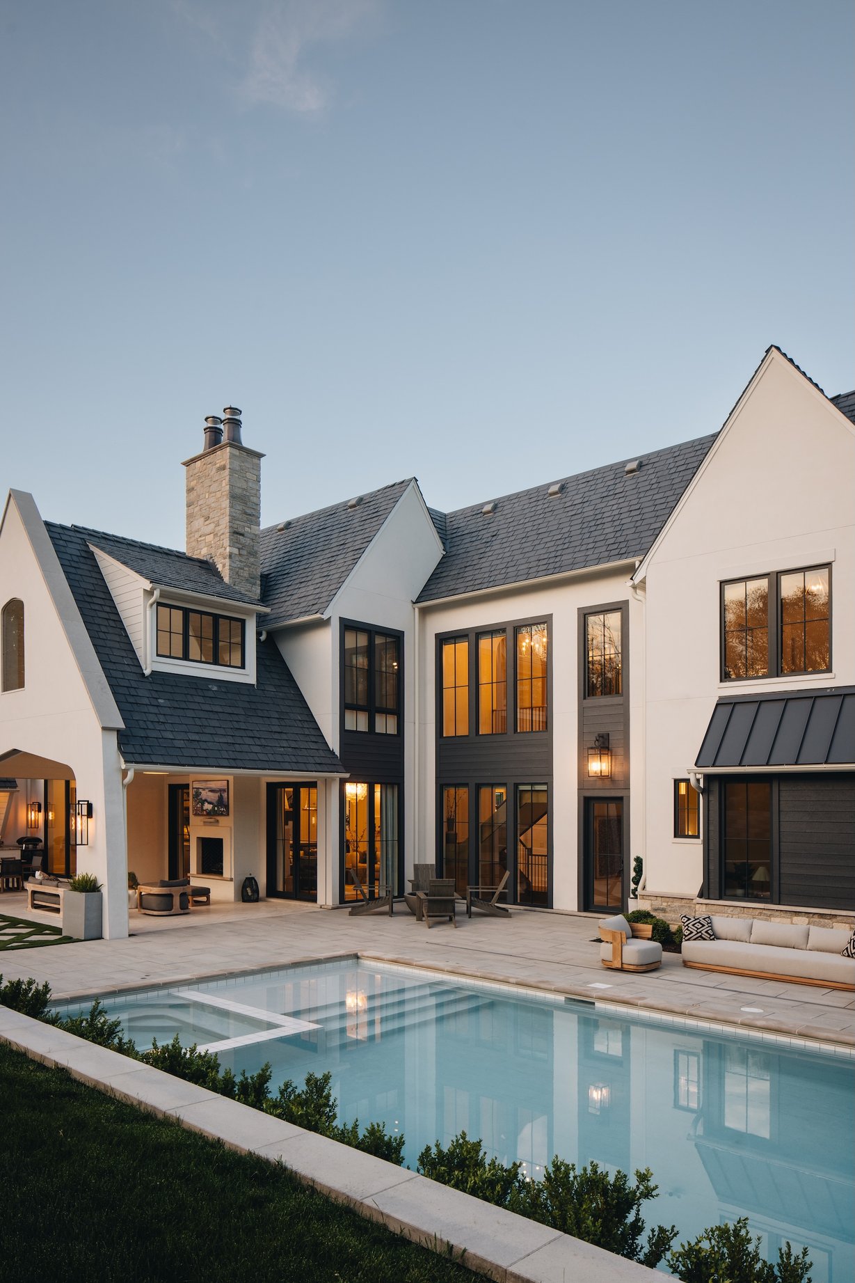 Dawn Reeves Design Luxury Interior Design Chicago Illinois Wilson Rear Exterior Pool Twilight