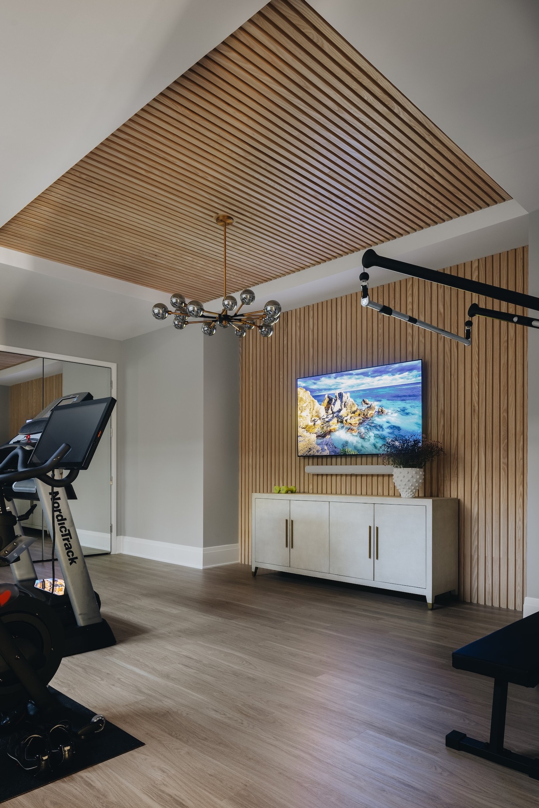 Dawn Reeves Design Luxury Interior Design Chicago Illinois Wilson Home Gym Wood Slat Ceiling TV Console