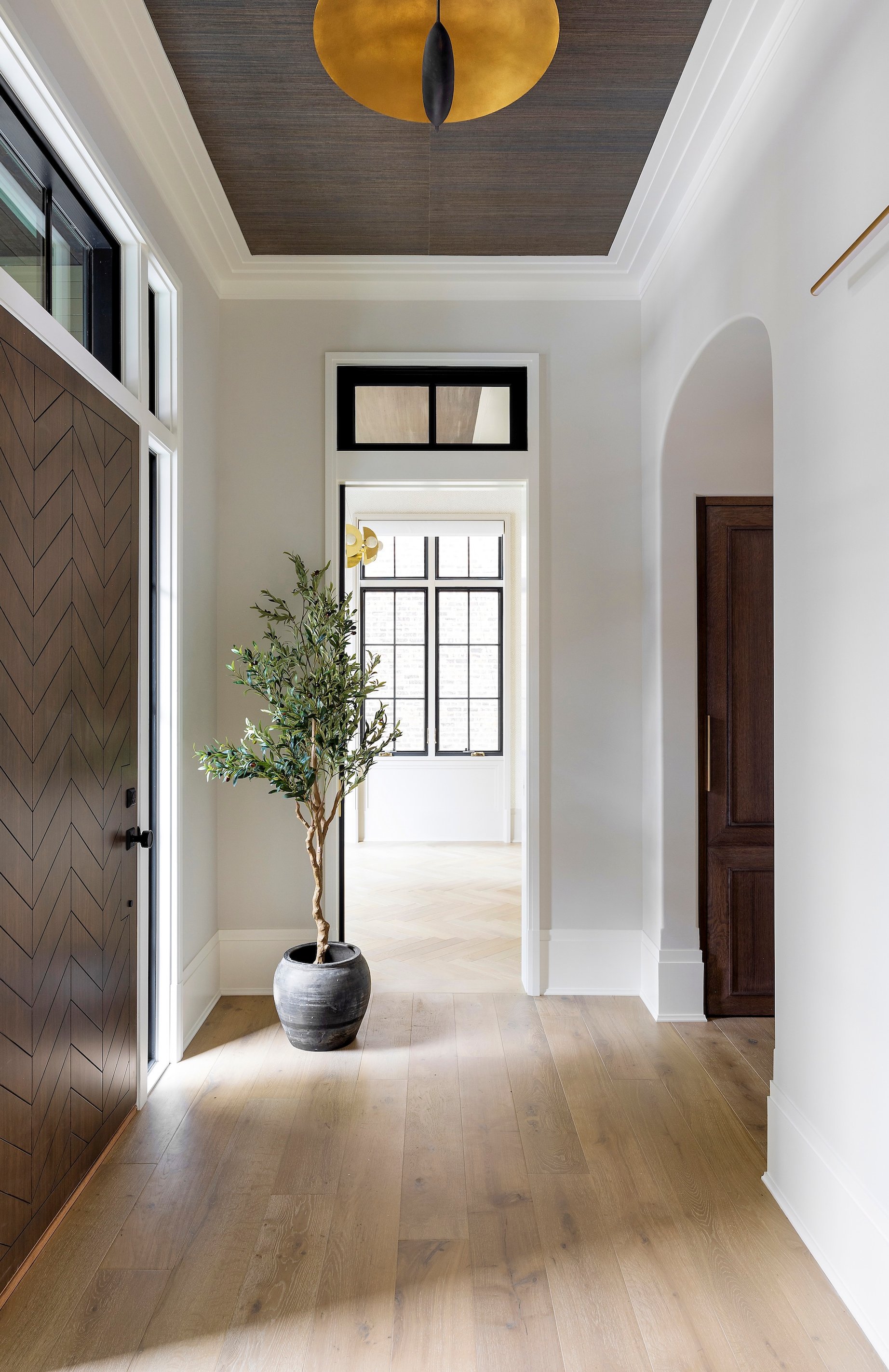 Dawn Reeves Design Luxury Interior Design Chicago Illinois Erie Foyer Olive Tree Wood Door