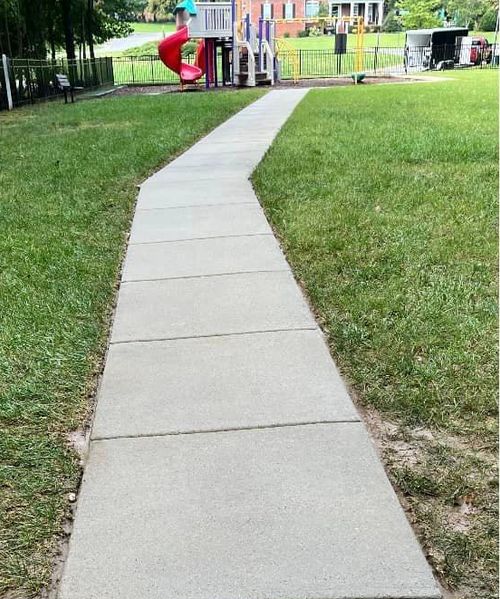 A View of the Sidewalk Heading Out of the Playground Freshly Cleaned