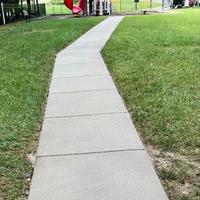 A View of the Sidewalk Heading Out of the Playground Freshly Cleaned