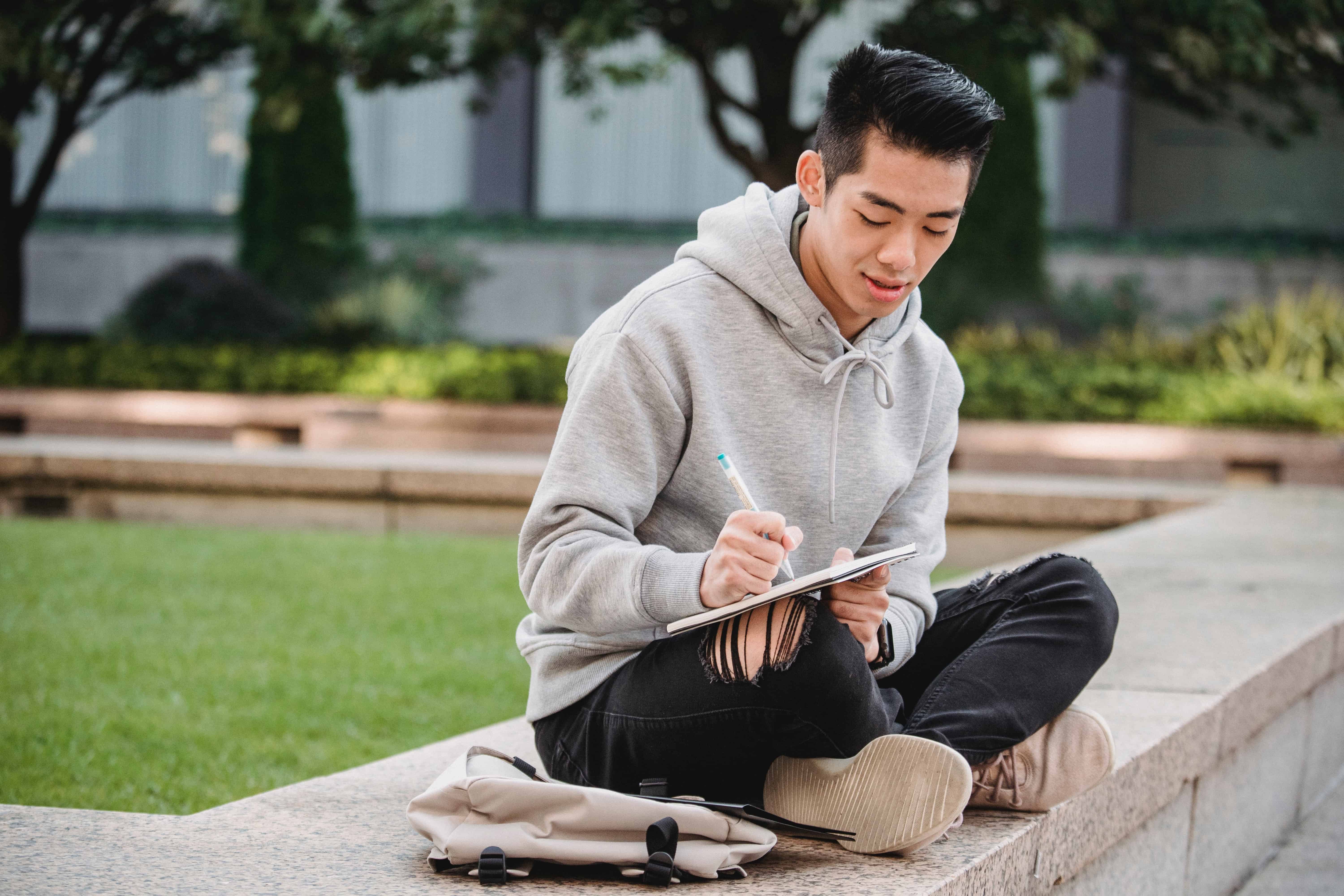 asian man drawing