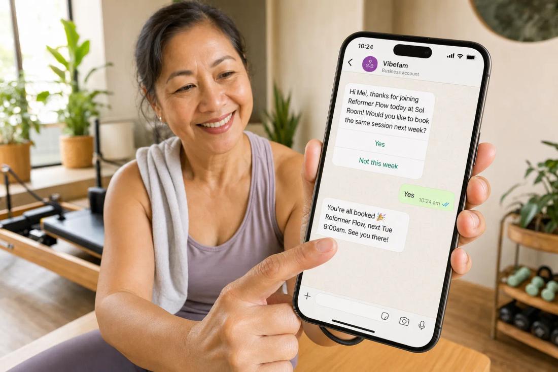 A member replies Yes to a WhatsApp message from Vibefam asking if she'd like to book next week's Reformer Flow class, and gets an instant booking confirmation.