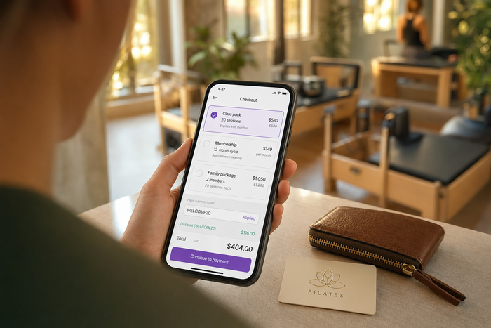 Boutique studio member checking out on the Vibefam mobile app — class pack with customizable expiry, recurring monthly membership with 12-month cycle option, family package selection, and a promo code applied at checkout.