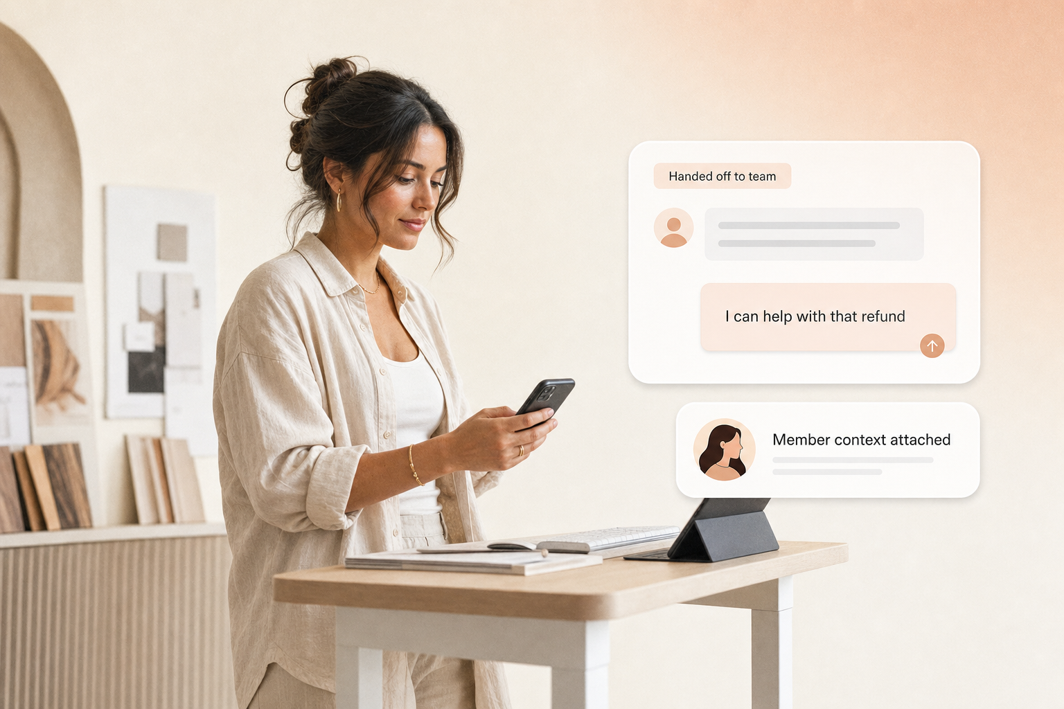 Studio team member calmly reviewing a chat handed off from the AI agent with member context attached
