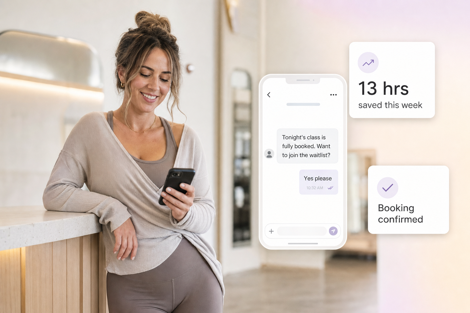 Boutique studio owner relaxed at reception counter while AI handles a member chat in floating UI cards