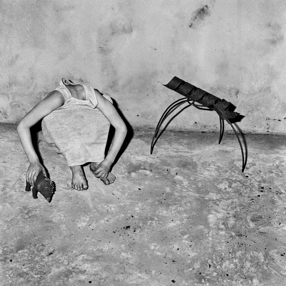 Artwork: Head inside shirt