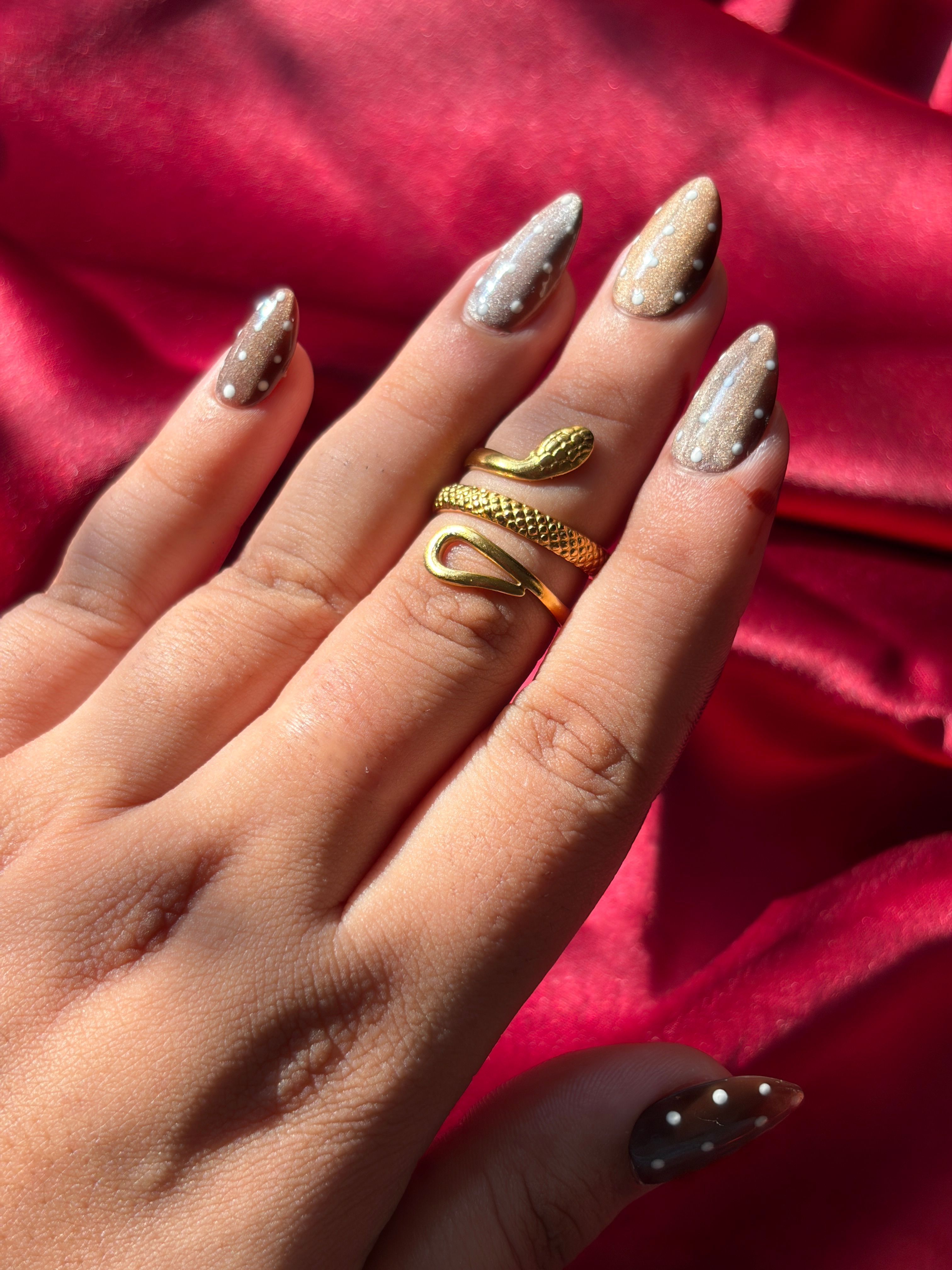 Gold Snake Ring worn on hand — view 2