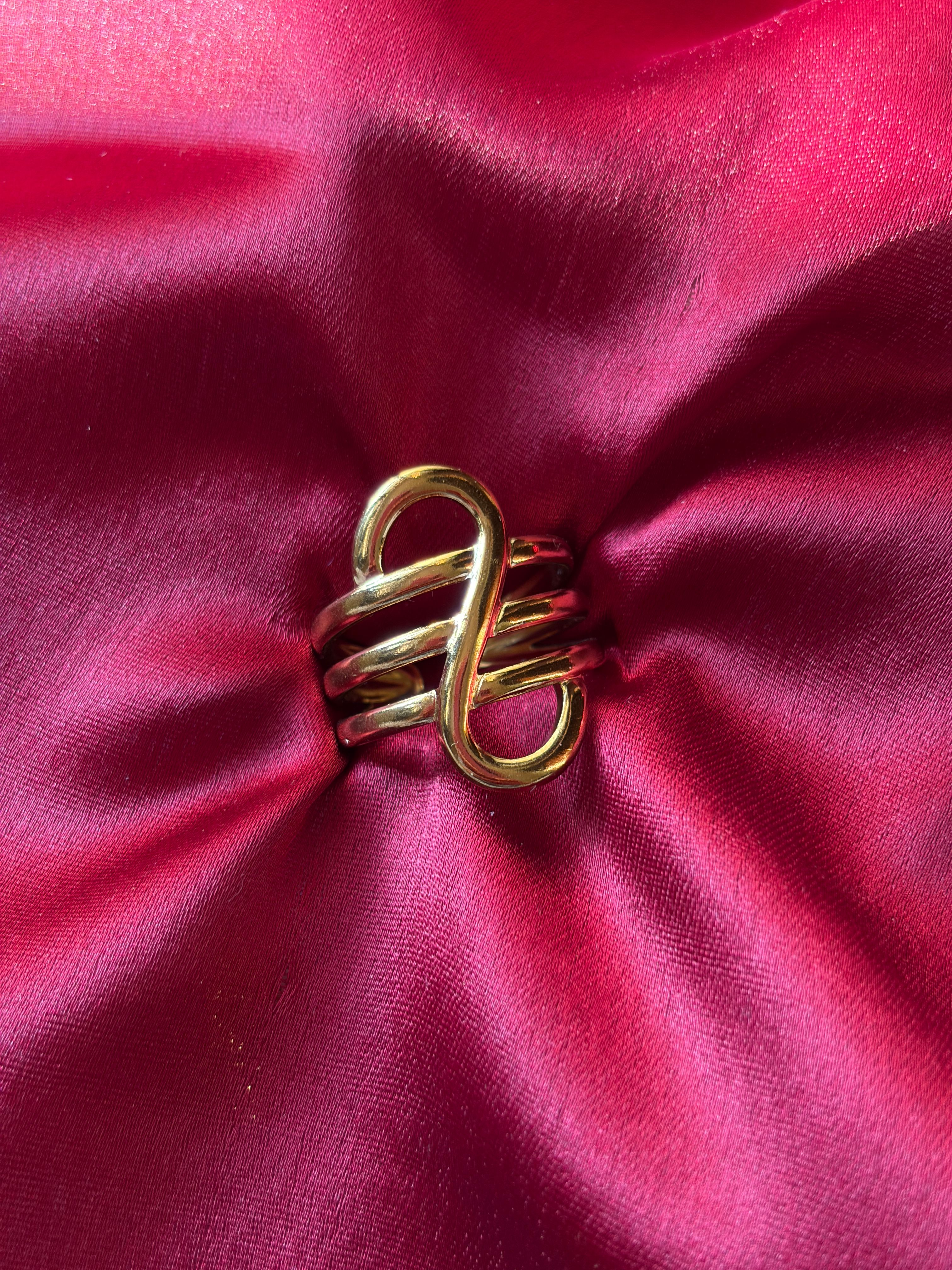 Gold Swirl Ring — gold-plated stainless steel, close-up view