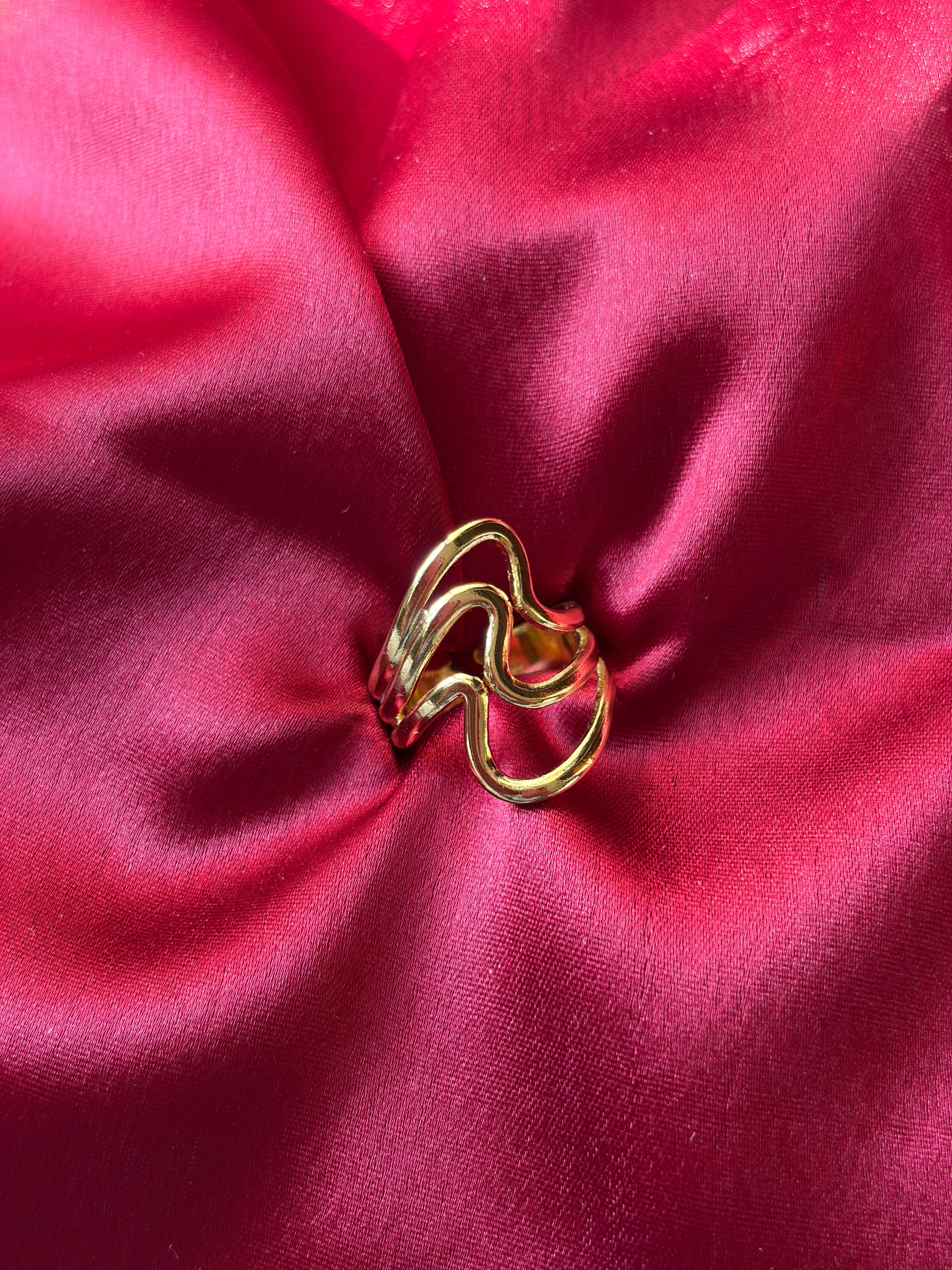Gold Wave Ring — gold-plated stainless steel, close-up view