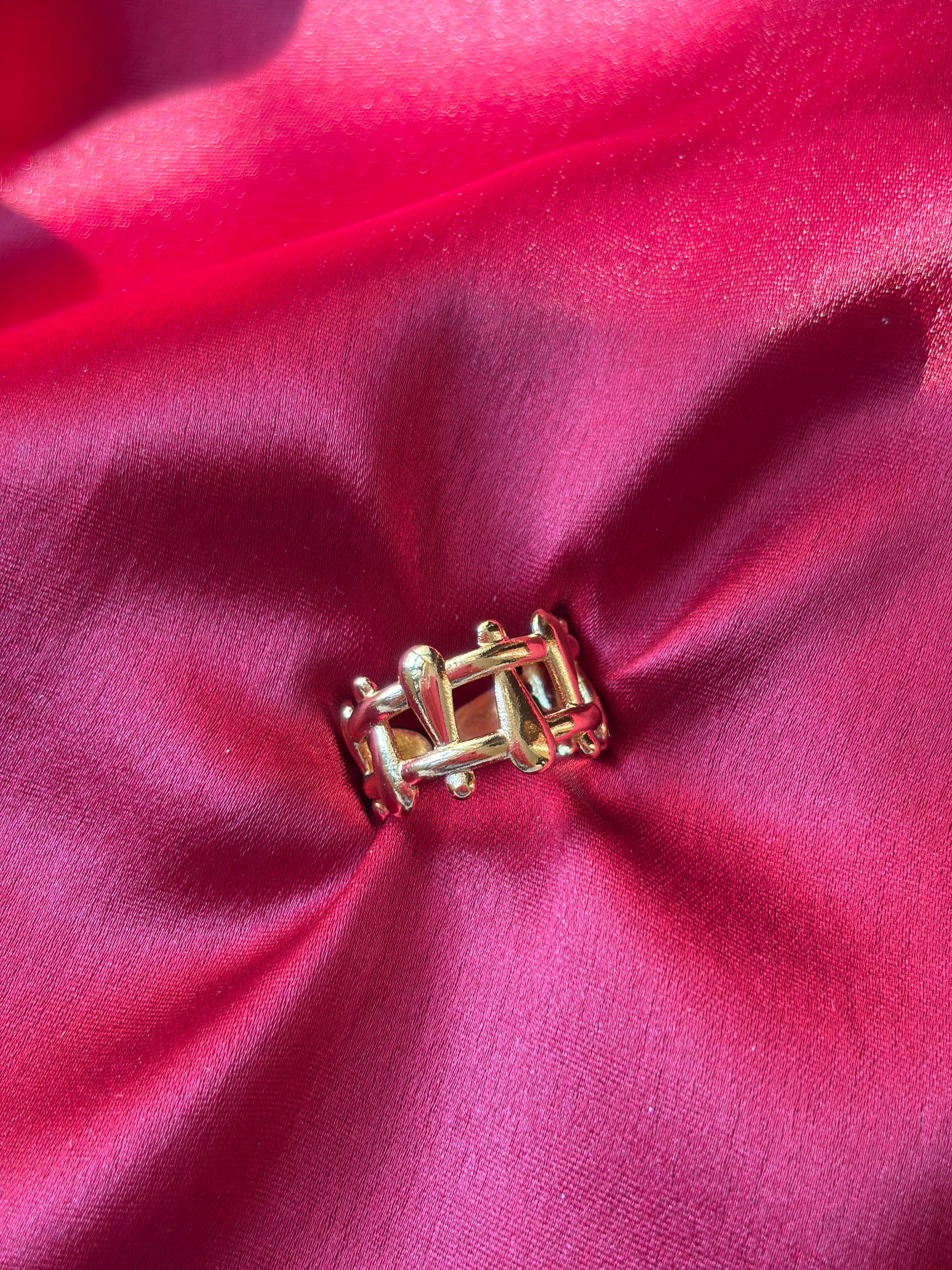 Gold Lattice Ring — gold-plated stainless steel, close-up view