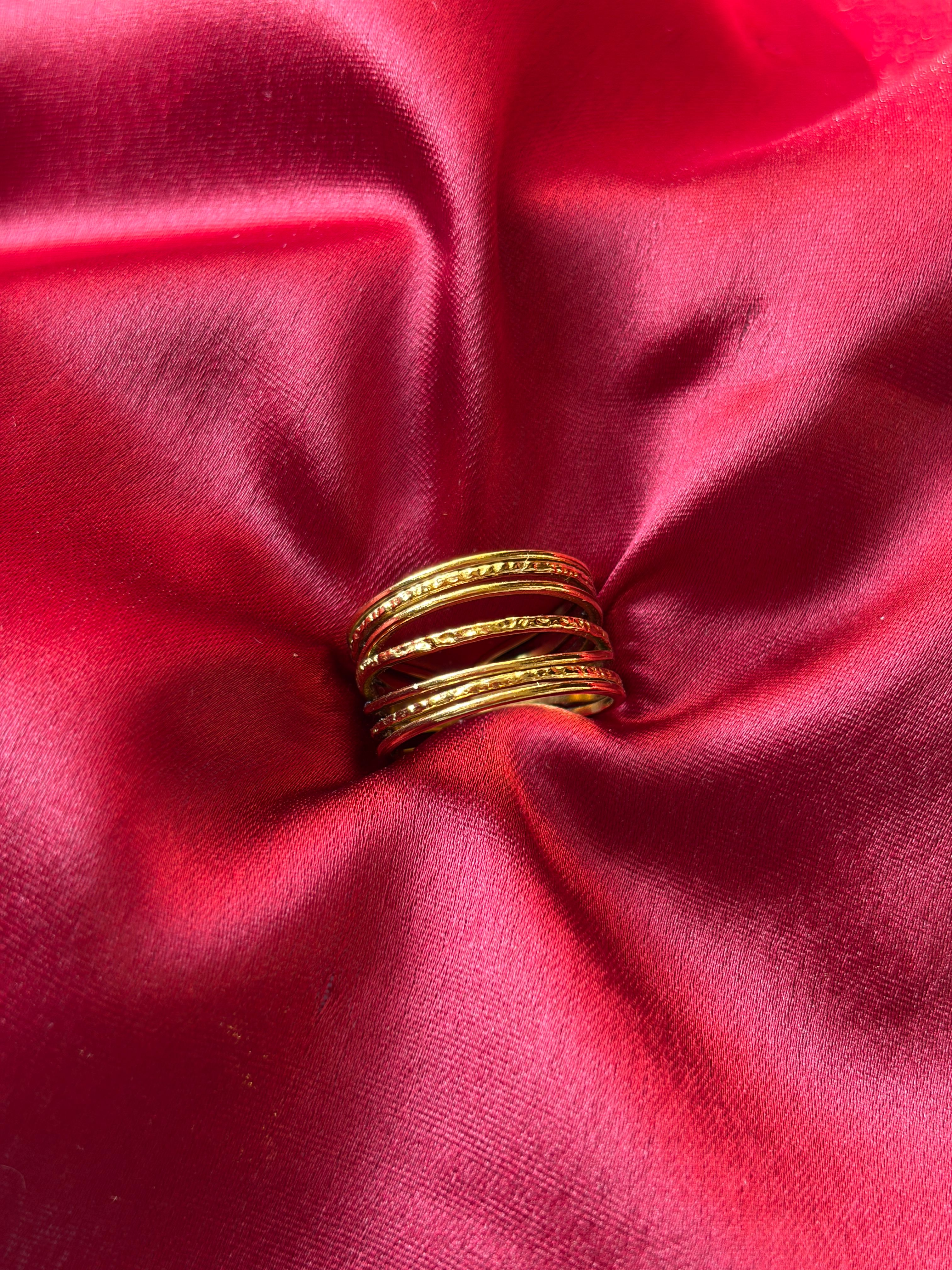 Gold Twist Band Ring — gold-plated stainless steel, close-up view