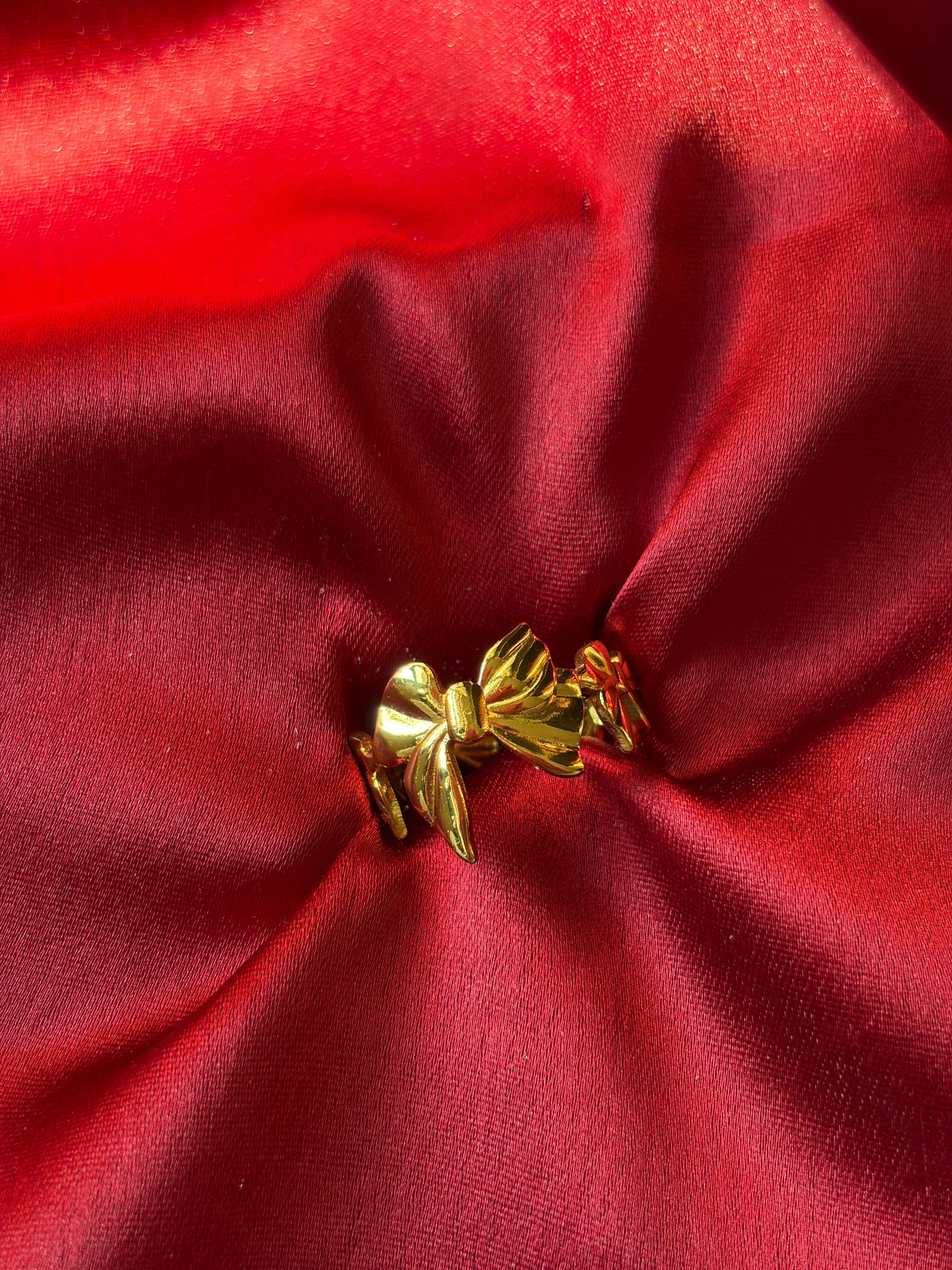 Gold Bow Ring — gold-plated stainless steel, close-up view