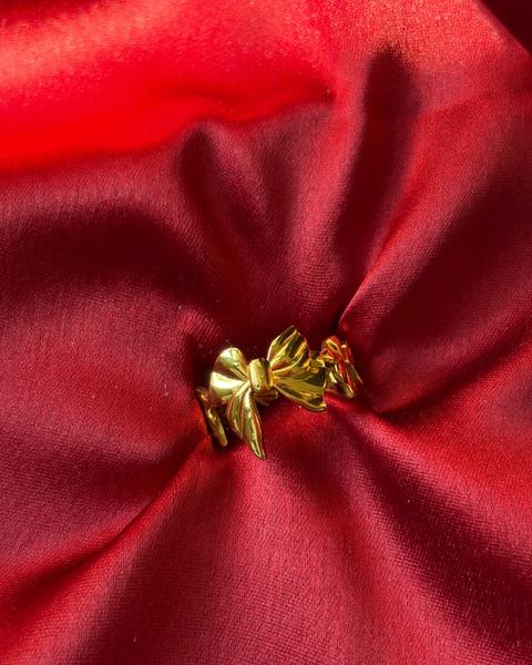 Gold Bow Ring — gold-plated stainless steel, close-up view