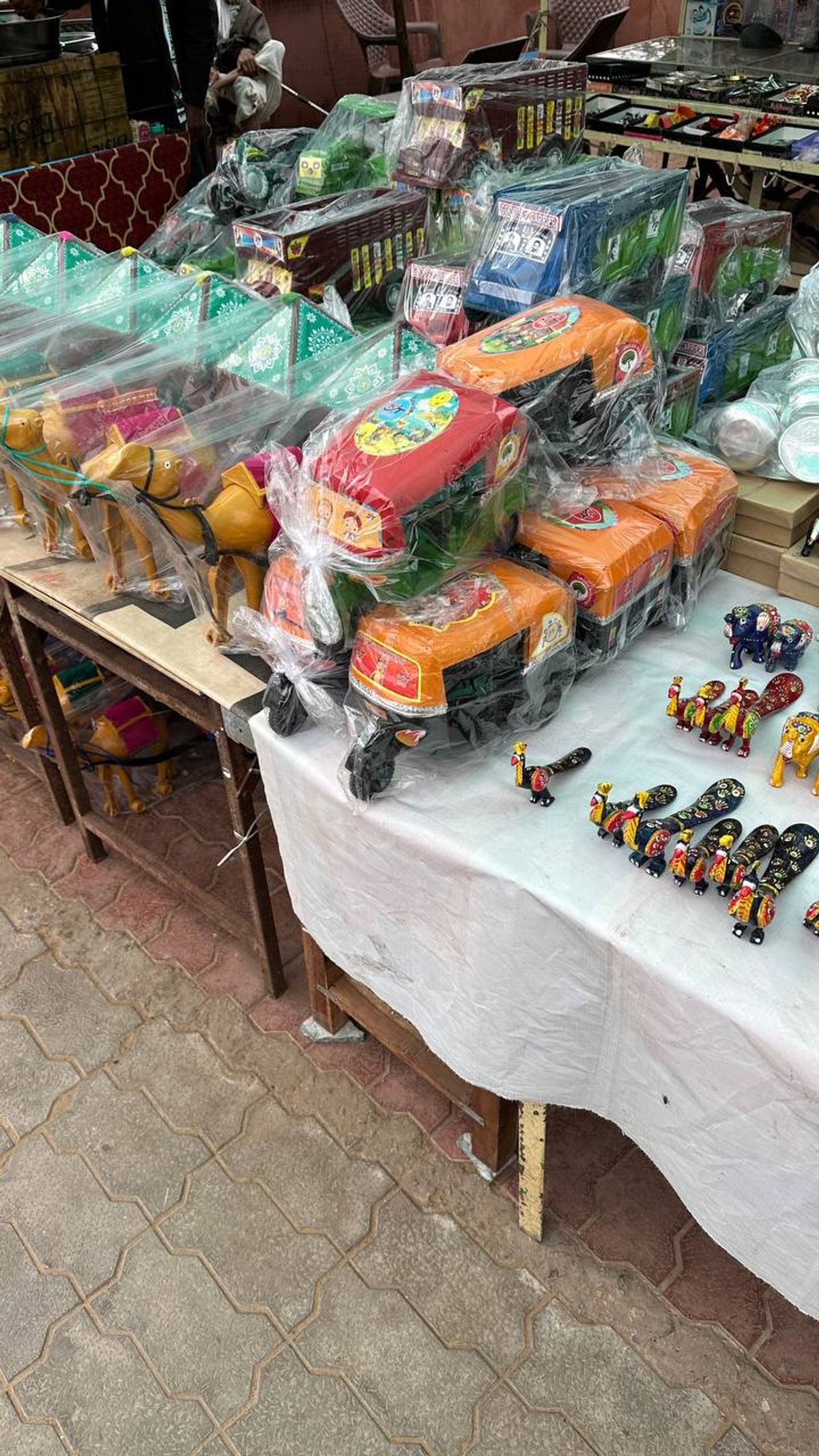 Toy vendors selling miniature auto-rickshaws