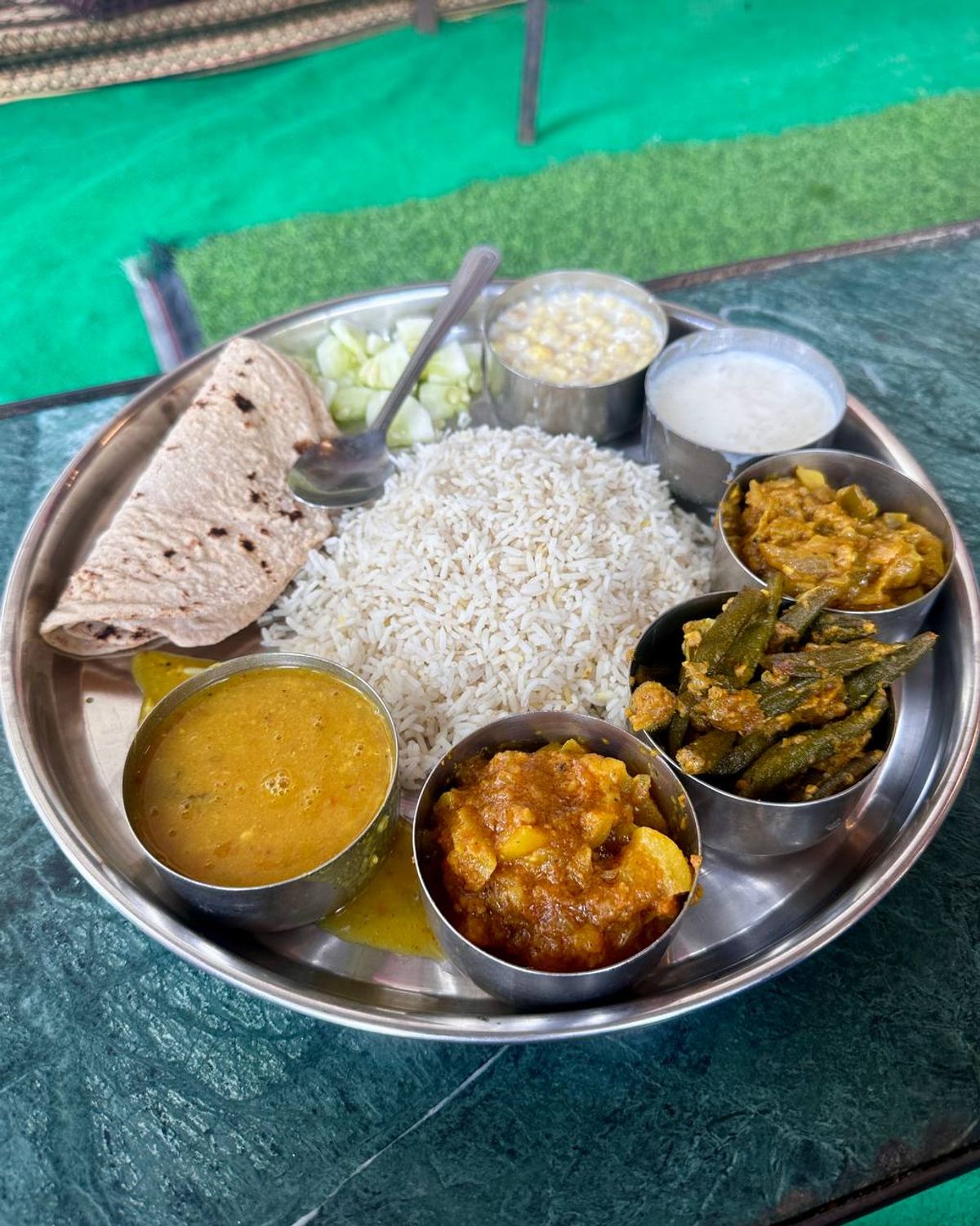 Highway thali with rice and multiple vegetables