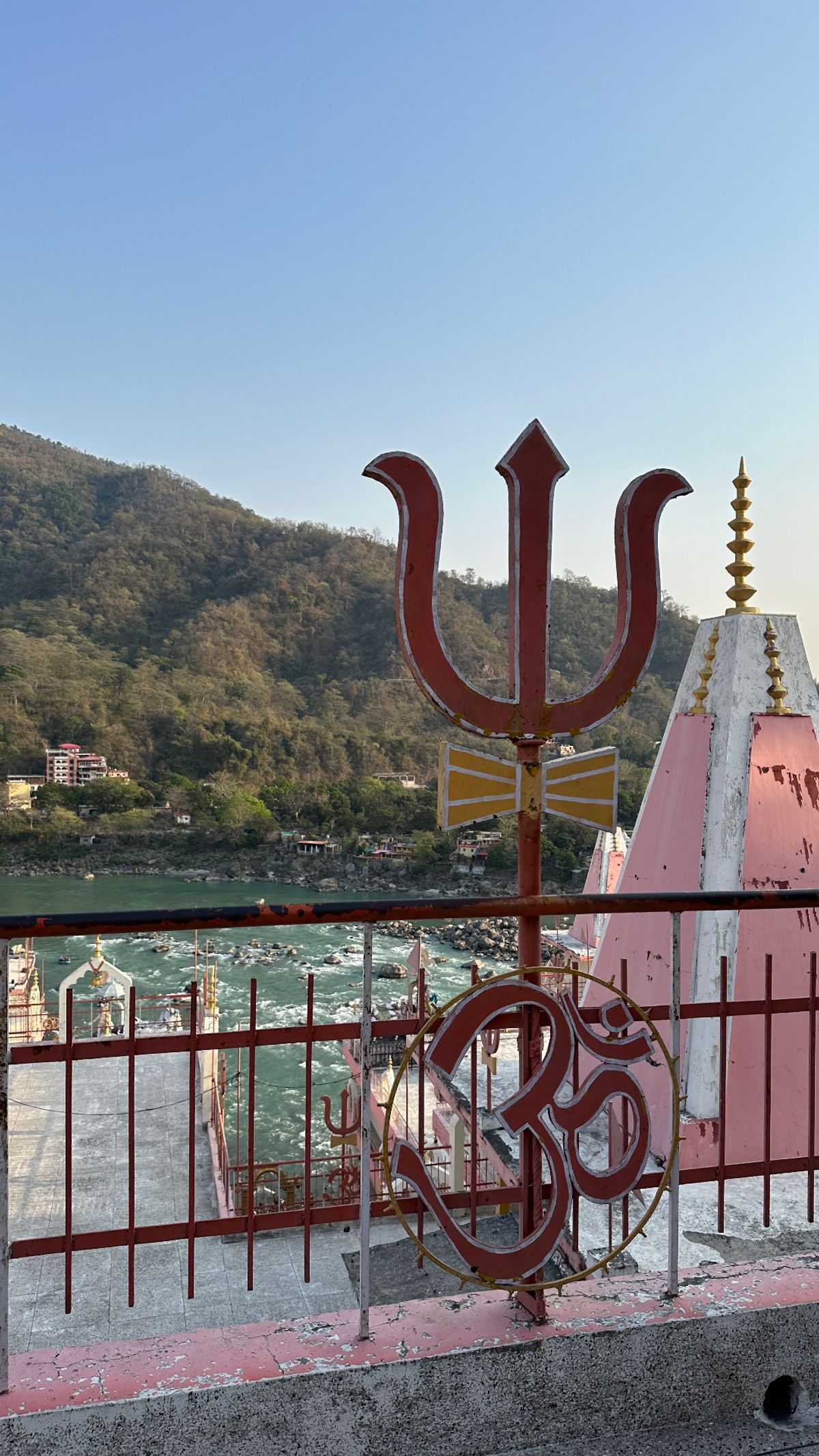 Trishul and Om symbol overlooking the Ganges in Rishikesh